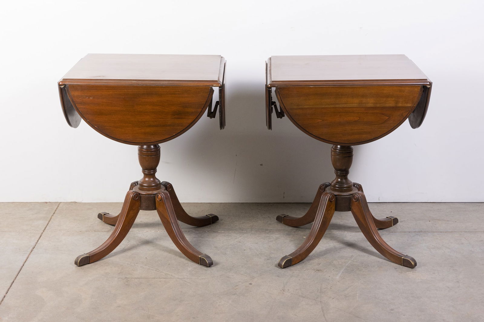 Pair of Antique Drop Leaf Clover Tables: Pair of Antique Drop Leaf Clover Tables Size 28" x 22" x 22" Literature Brooks Auction is not responsible for outbids. Questions? Call the office at (856) 694-2960 or email us directly at info@brook