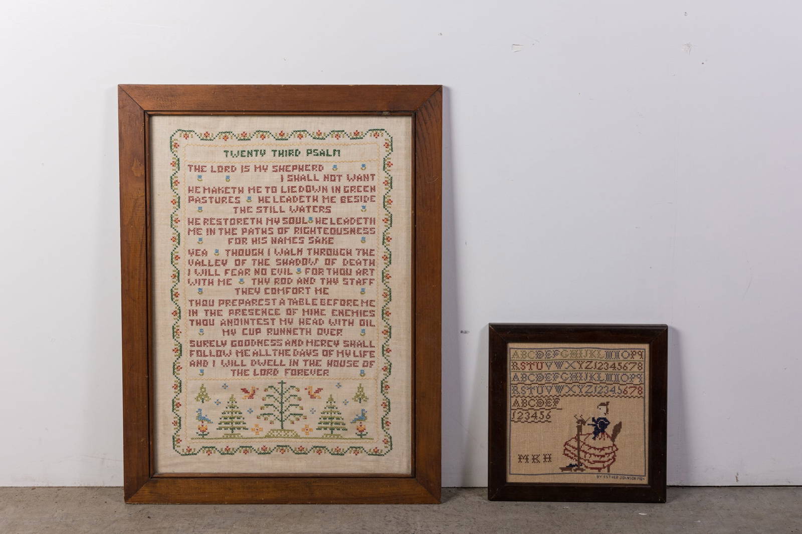 Two Framed Pieces Of Cross Stitch Auction