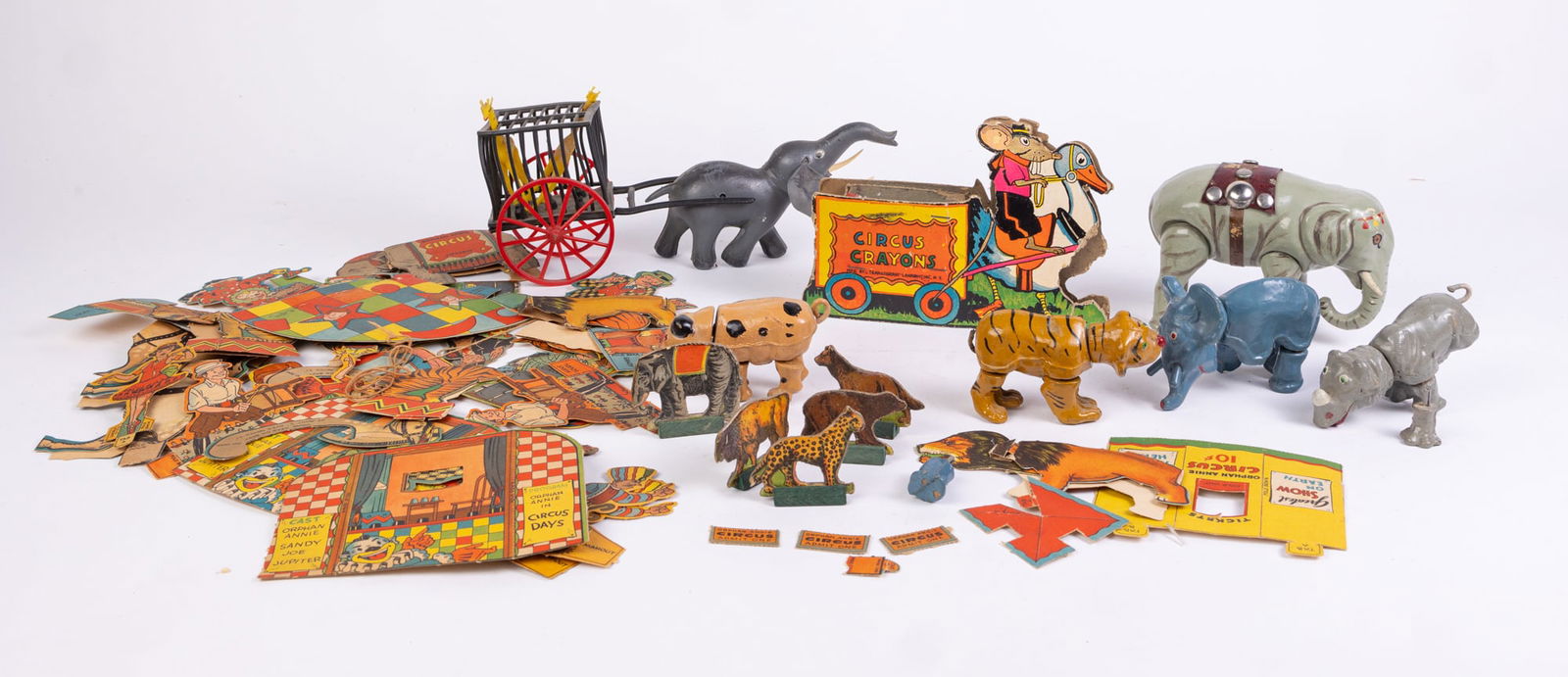 Lot of Assorted Circus Toys: Lot of Assorted Circus Toys: circus animal cutouts - composite vintage circus animal figurines - vintage circus elephant cart toy - and more Size 7" x 12" x 12" (box size) Literature Brooks Auction i