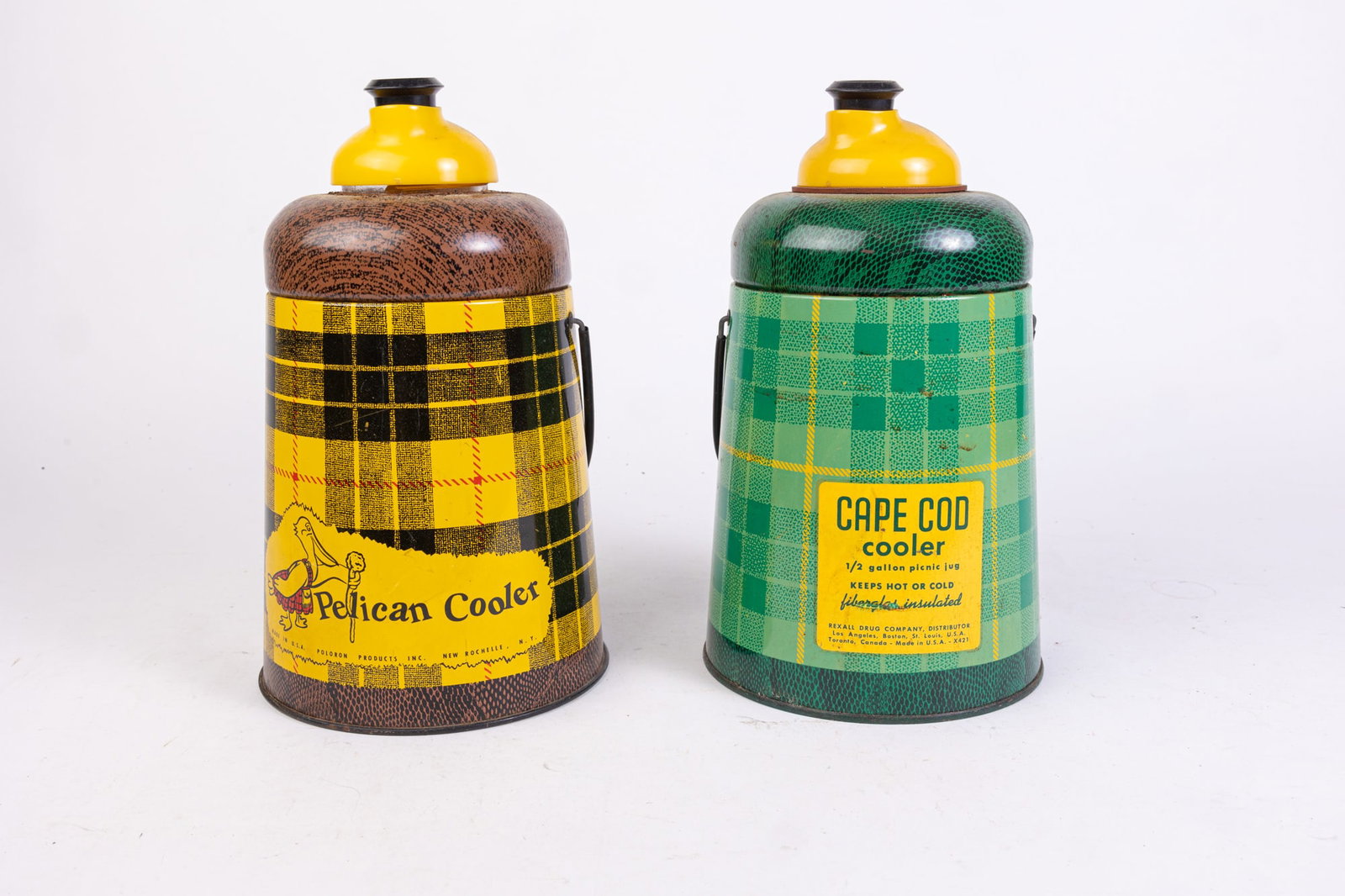 Two Vintage Pelican Coolers: Two Vintage Pelican Coolers Size 7" x 12" x 12" (box size) Literature Brooks Auction is not responsible for outbids. Questions? Call the office at (856) 694-2960 or email us directly at info@brooks.