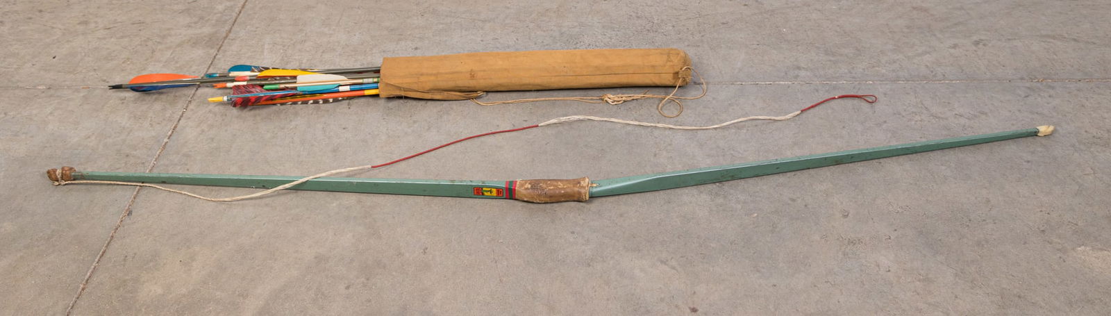 Vintage Bow and Arrows: Vintage Bow and Arrows Size 65" H (bow) Literature Brooks Auction is not responsible for outbids. Questions? Call the office at (856) 694-2960 or email us directly at info@brooks.auction. 