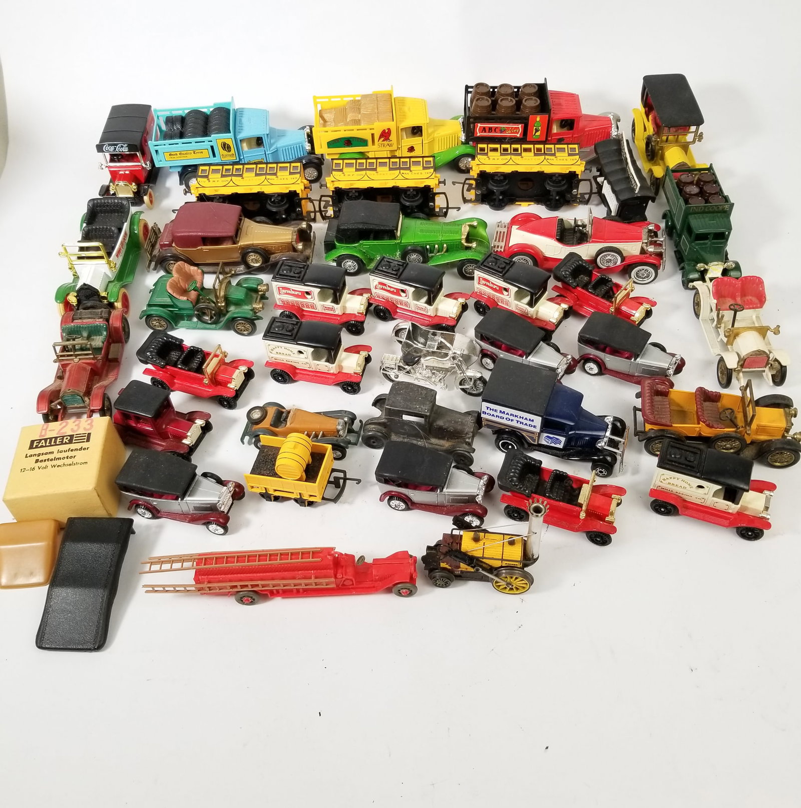 Diecast Vintage Model Toy Cars: Diecast Vintage Model Toy Cars: Tomica - Matchbox - and more Size 7" x 12" x 12" (box size) Literature Brooks Auction is not responsible for outbids. Questions? Call the office at (856) 694-2960 or