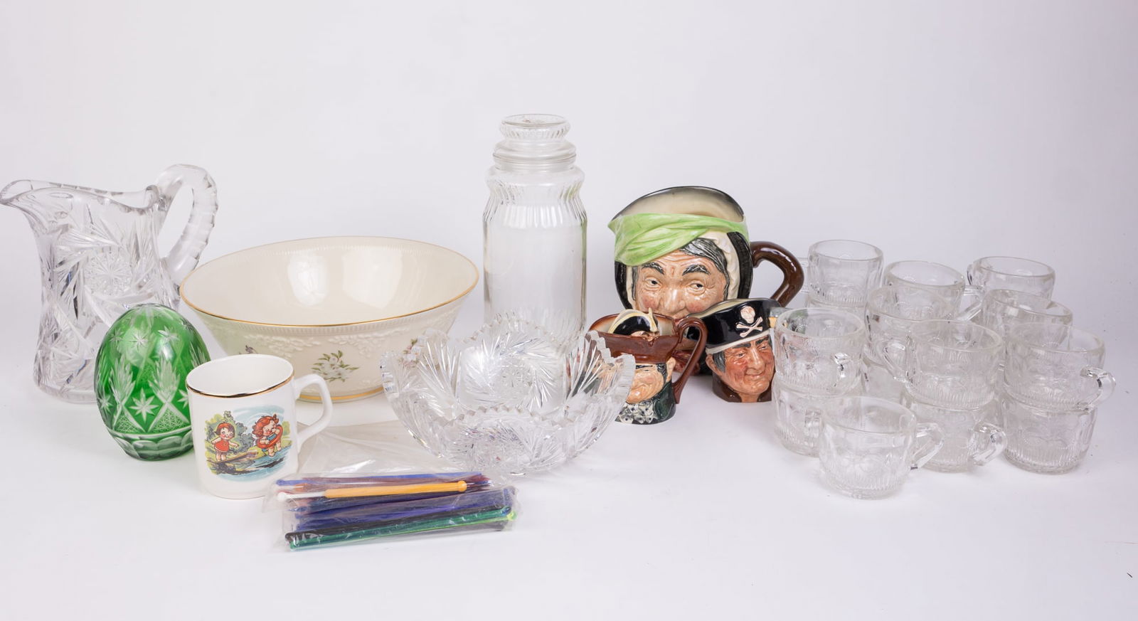 Decorative Glassware and Porcelain Featuring Lenox and Royal Doulton: Decorative Glassware and Porcelain Featuring Lenox and Royal Doulton: Lenox bowl - Royal Doulton Toby mugs - cut crystal - and more Size 7" x 12" x 12" (box size) Literature Brooks Auction is not res