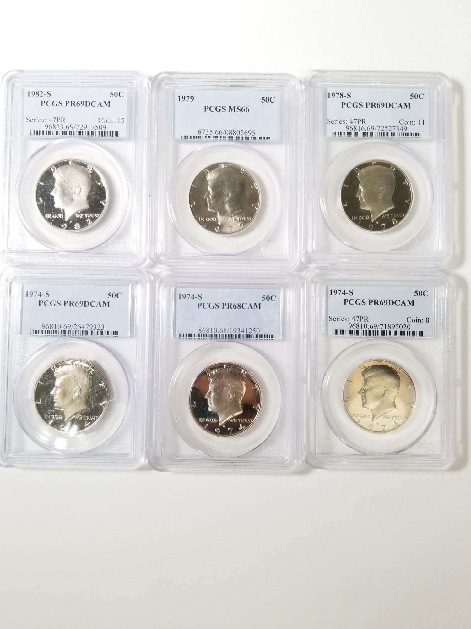 Six Graded Kennedy Half Dollars (1 of 6)