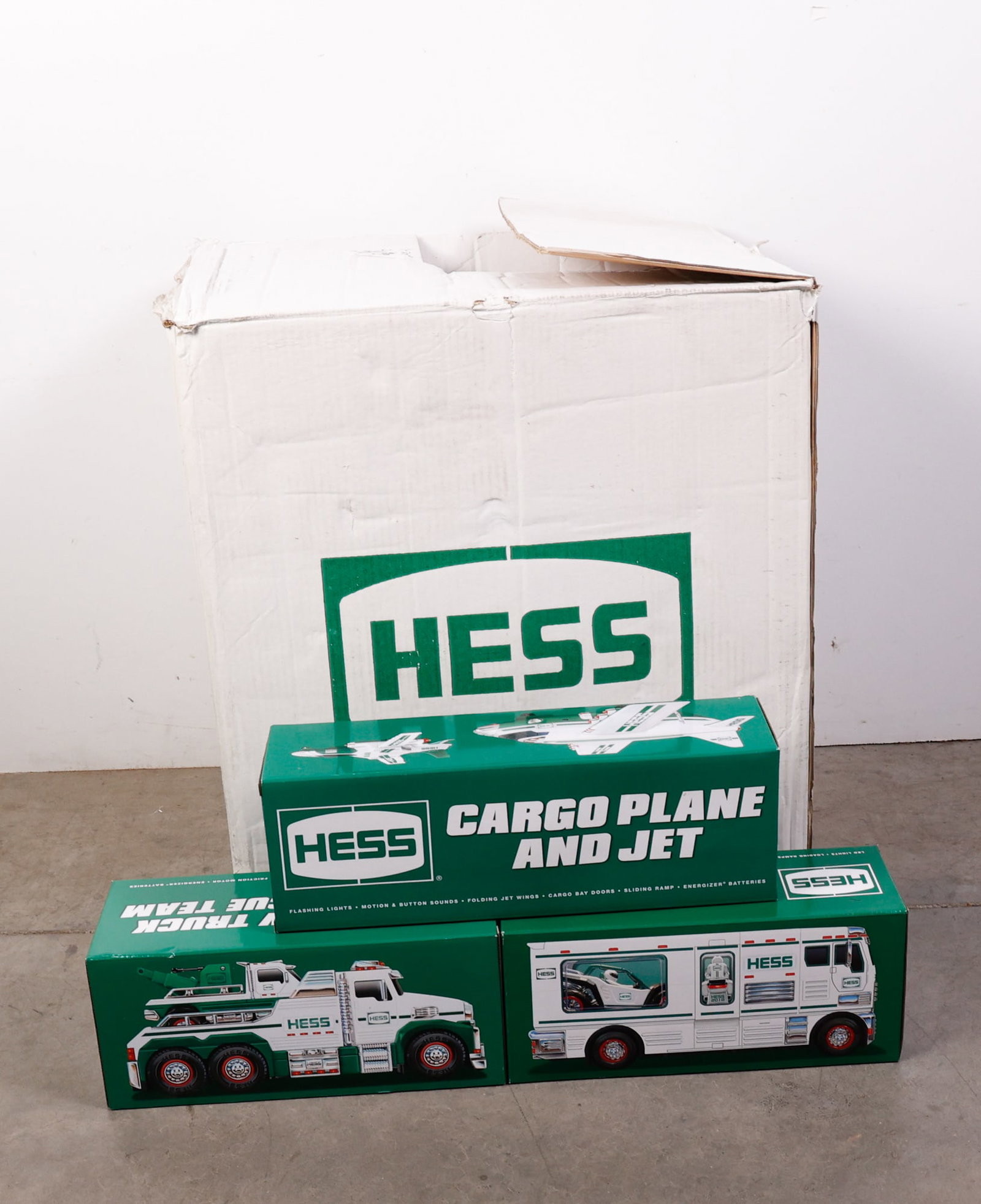 Fifteen (15) Vintage Hess Trucks in Box (1 of 2)