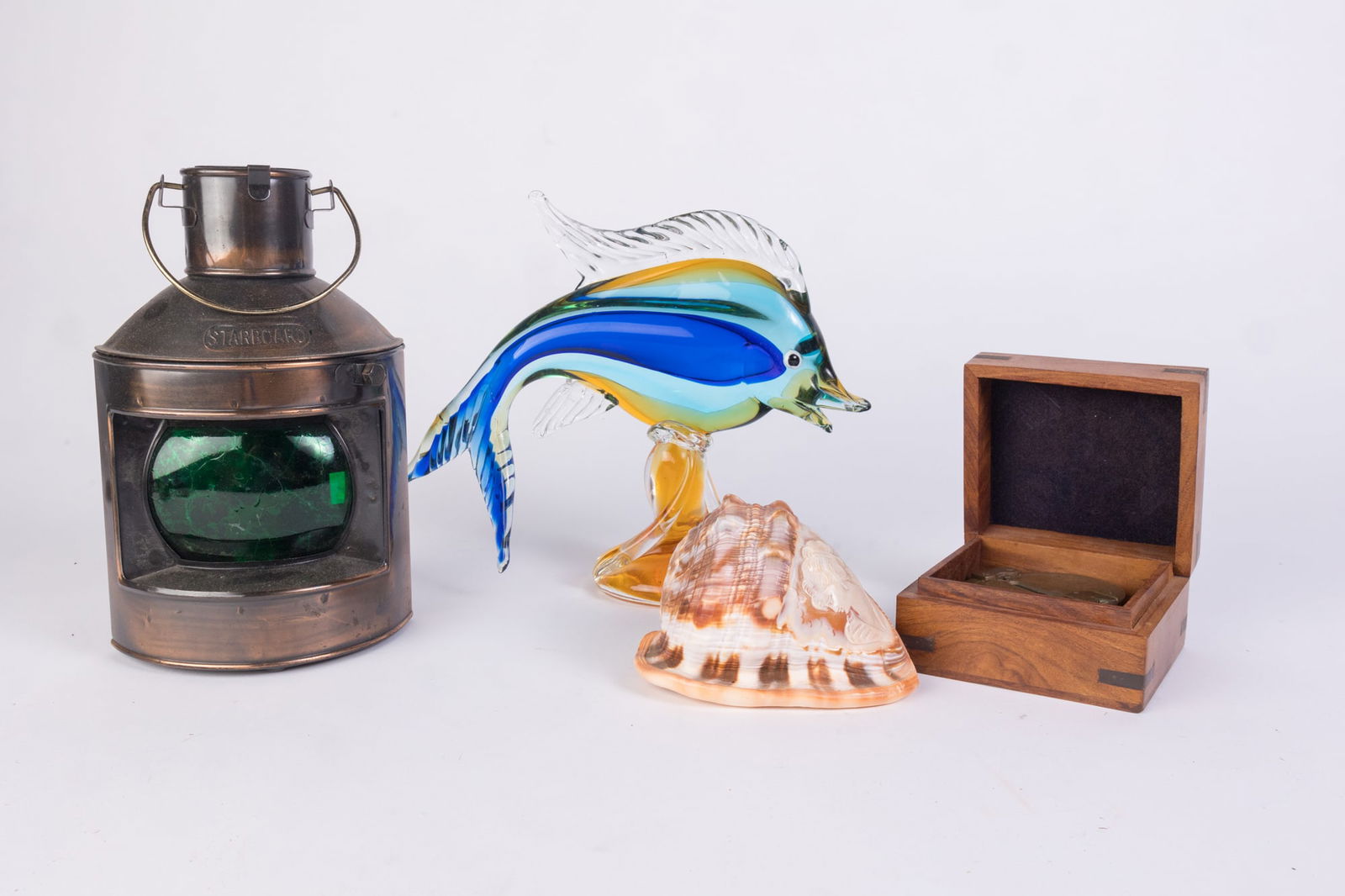 Nautical Assortment Lot Featuring Murano Fish & Antique Compass: Nautical Assortment Lot Featuring Murano Fish & Antique Compass Size 7" x 12" x 12" Literature Brooks Auction is not responsible for outbids. Questions? Call the office at (856) 694-2960 or email us