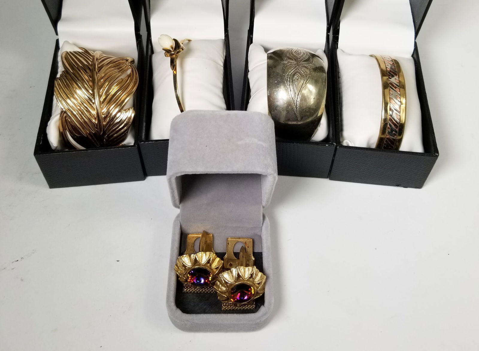 Four Bracelets and a Set of Cufflinks (1 of 5)