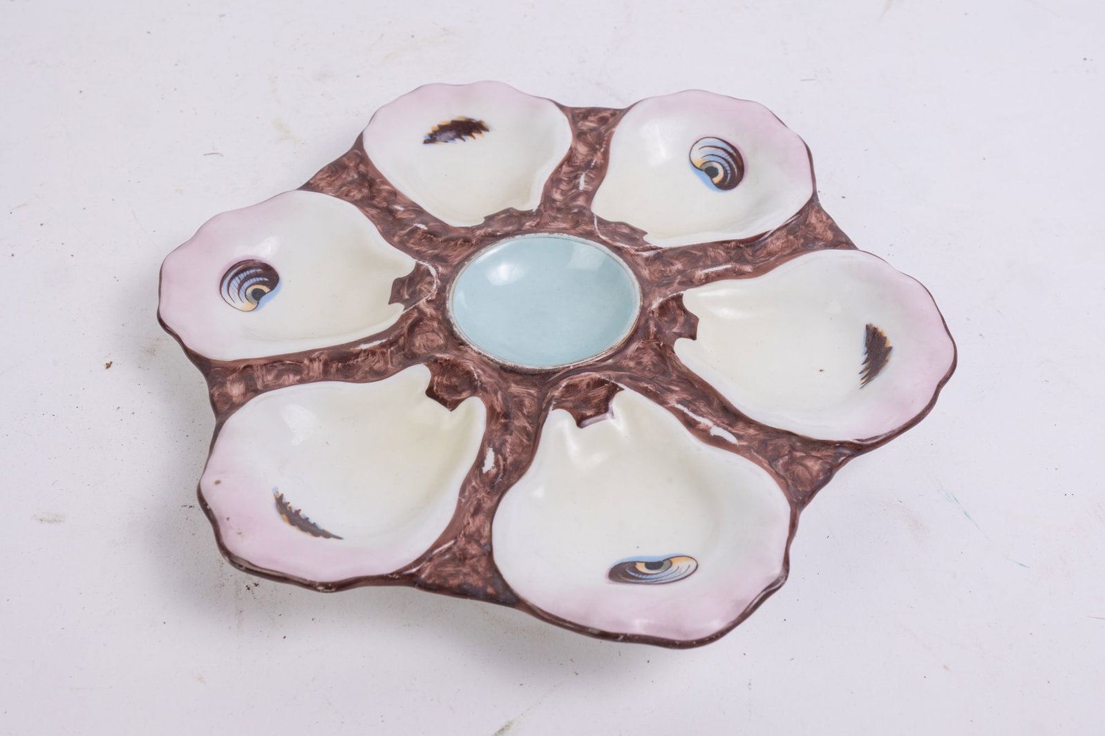 Antique French Majolica Oyster Scalloped Plate: Antique French Majolica Oyster Scalloped Plate Size 7" x 12" x 12" Literature Brooks Auction is not responsible for outbids. Questions? Call the office at (856) 694-2960 or email us directly at info