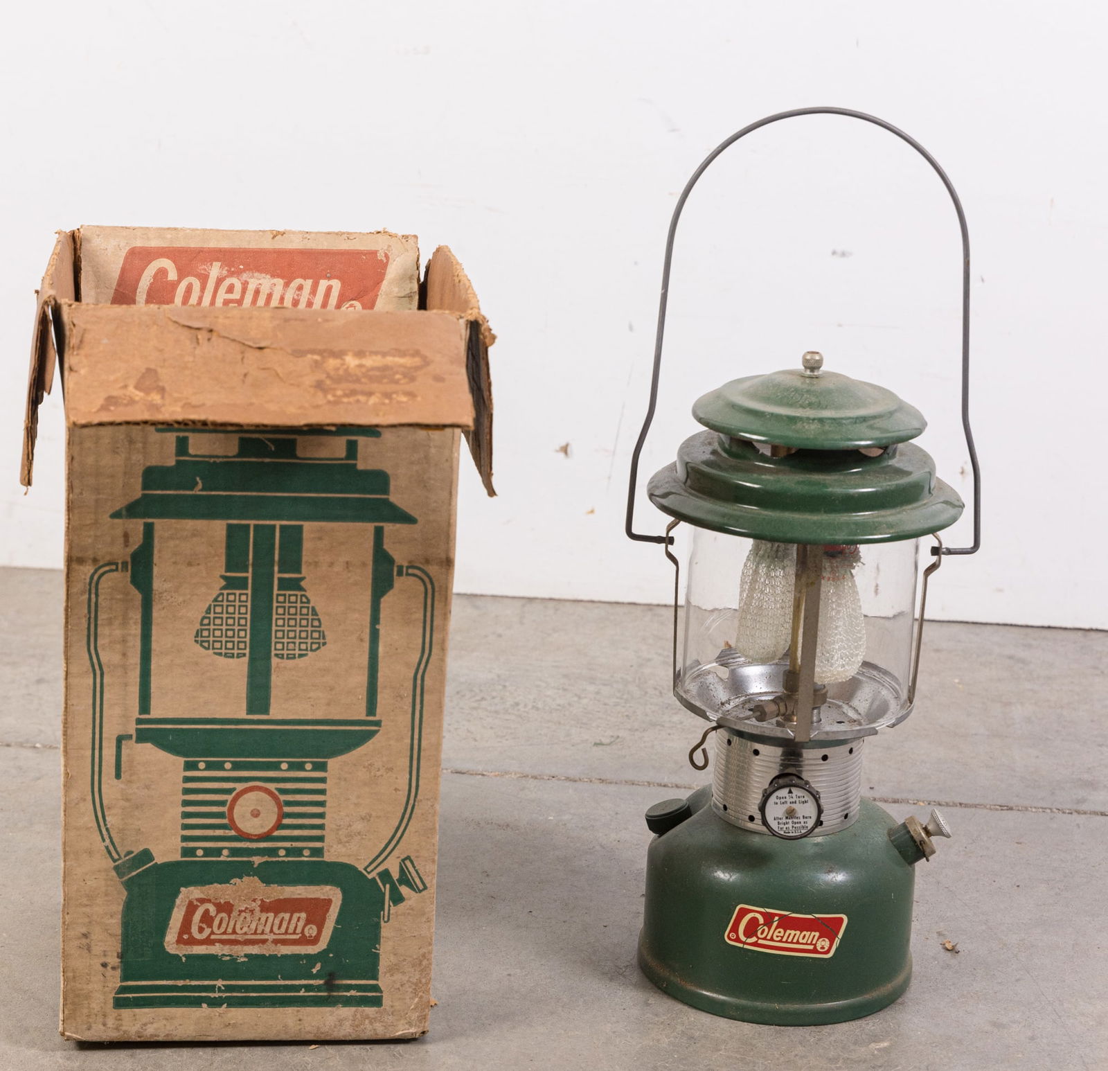 Vintage Coleman Two Mantle Green Lantern in Original Box: Vintage Coleman Two Mantle Green Lantern in Original Box Size 16" x 8" x 8" Literature Brooks Auction is not responsible for outbids. Questions? Call the office at (856) 694-2960 or email us directl