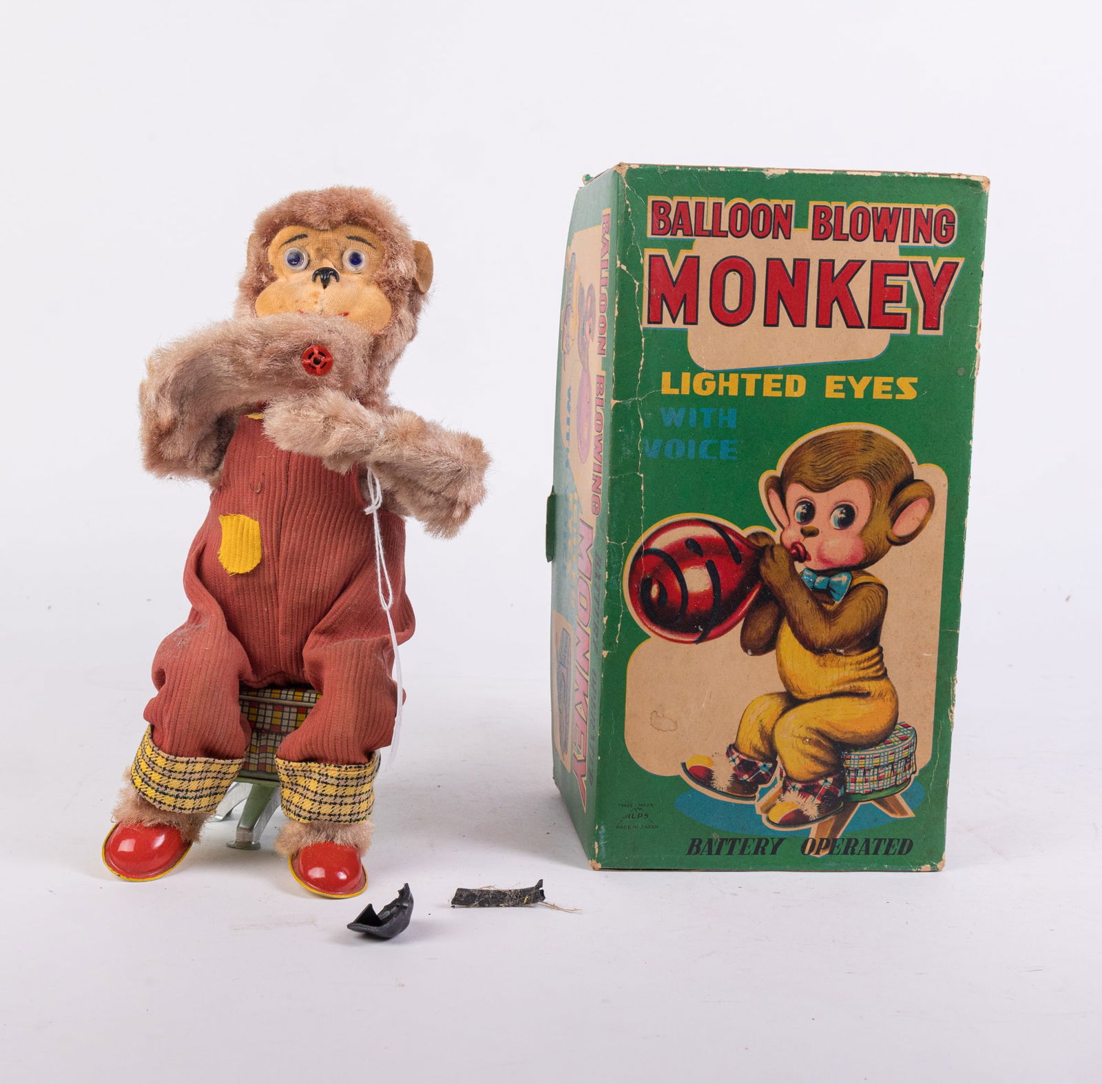 Vintage "Balloon Blowing Monkey - Lighted Eyes with Voice" Toy in Original Box: Vintage "Balloon Blowing Monkey - Lighted Eyes with Voice" Toy in Original Box Size 7" x 12" x 12" Literature Brooks Auction is not responsible for outbids. Questions? Call the office at (856) 694-2