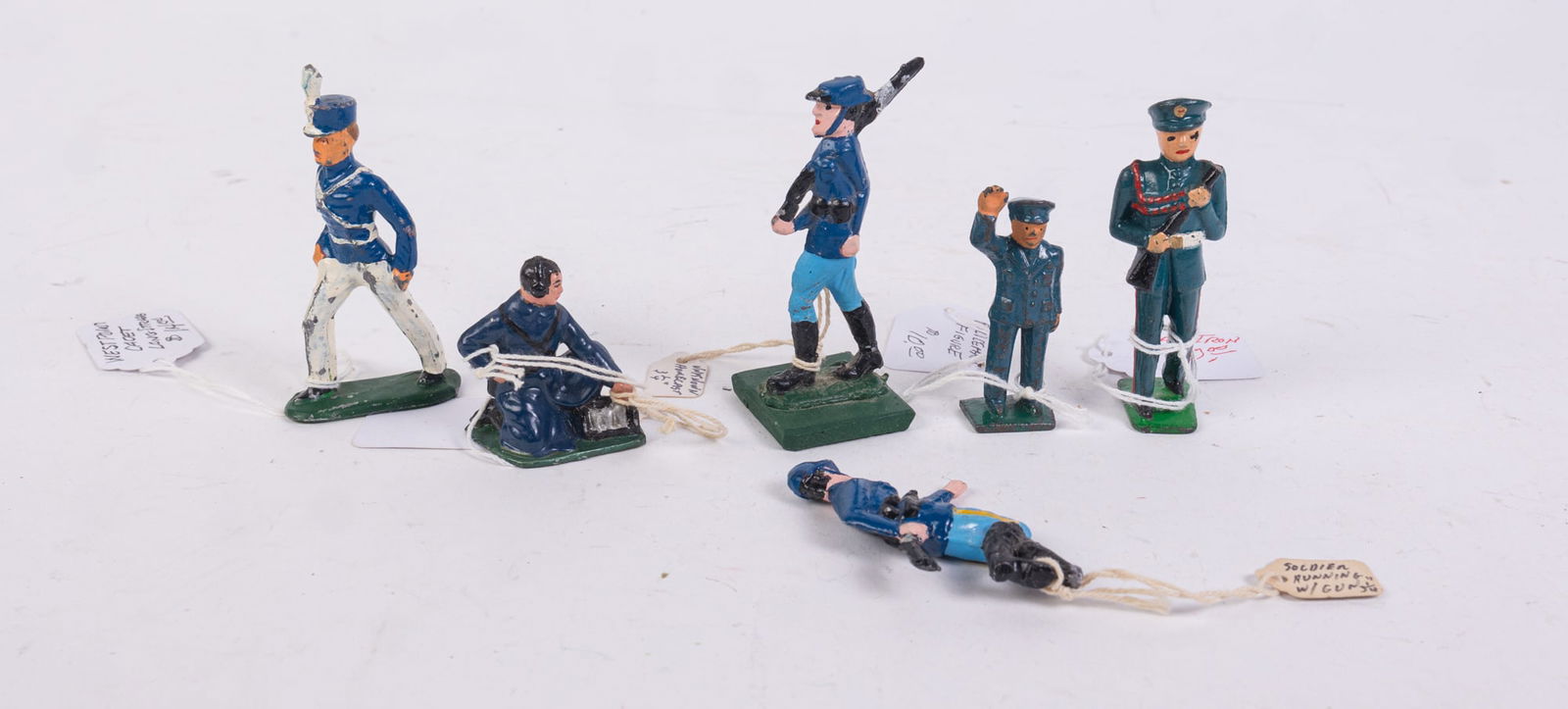 Antique Lead Soldier Toys Featuring Grey Iron: Antique Lead Soldier Toys Featuring Grey Iron Size 7" x 12" x 12" Literature Brooks Auction is not responsible for outbids. Questions? Call the office at (856) 694-2960 or email us directly at info@