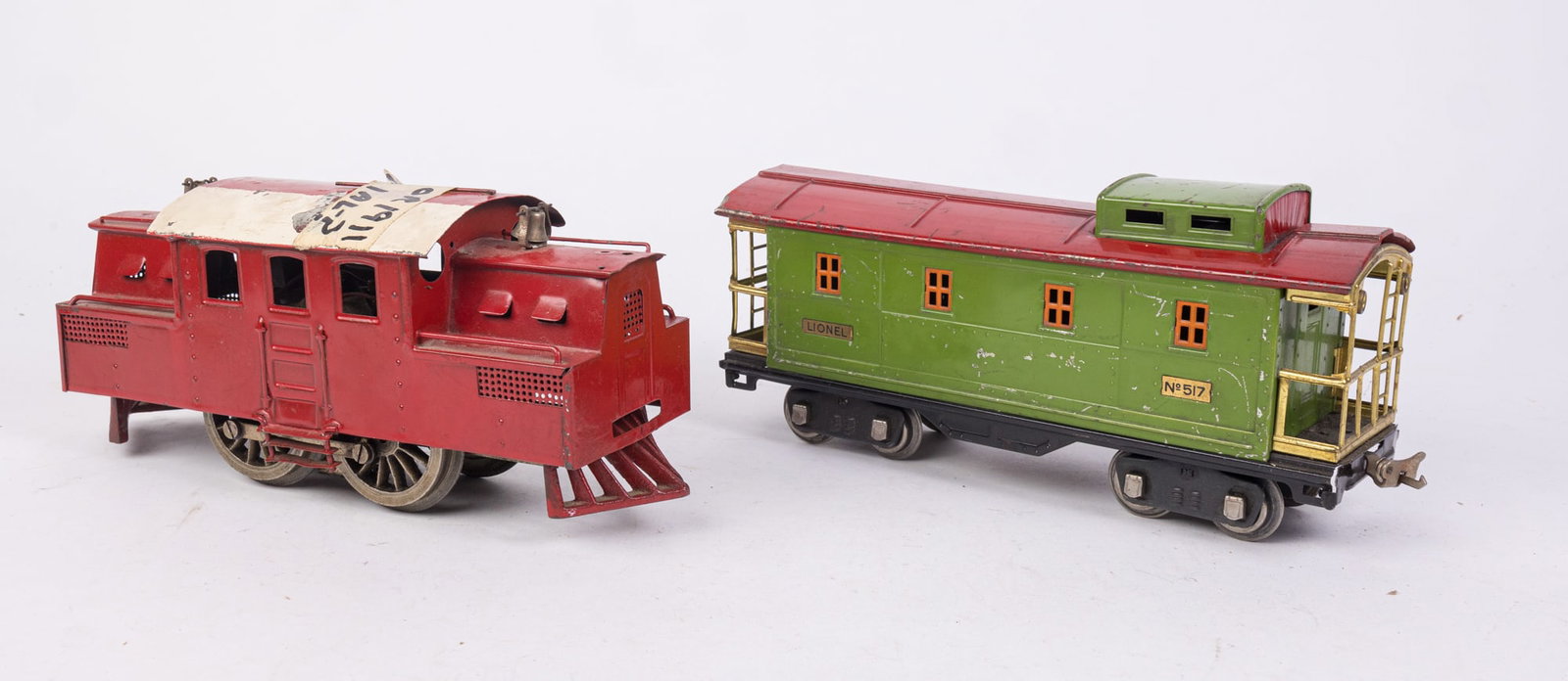 Two Standard Gauge Lionel Prewars Featuring No.517: Two Standard Gauge Lionel Prewars Featuring No.517 Size 7" x 12" x 12" Literature Brooks Auction is not responsible for outbids. Questions? Call the office at (856) 694-2960 or email us directly at