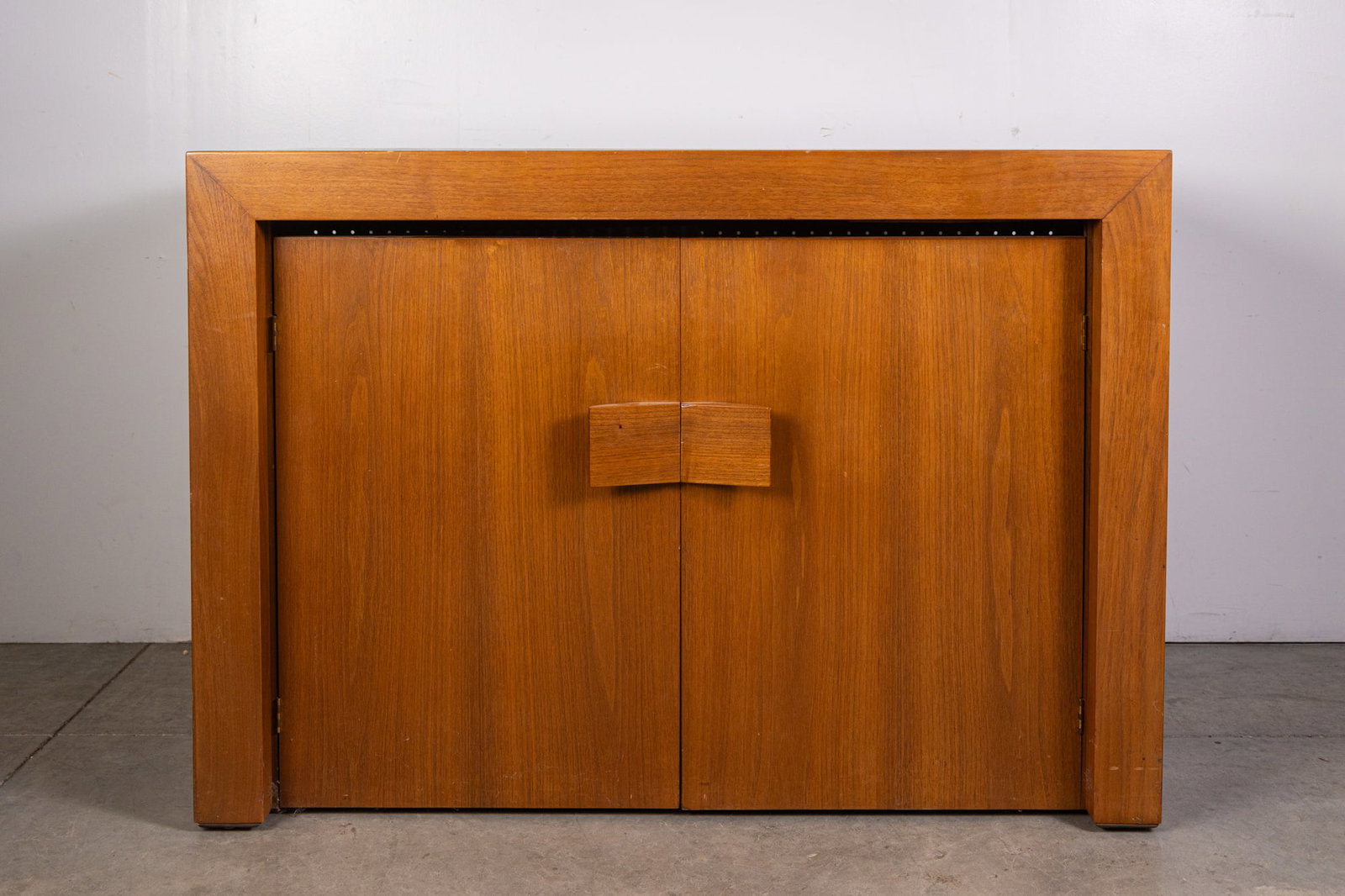 Stanley Young for Glenn of California Mid Century Modern Teak Extending Table/Cabinet: Stanley Young for Glenn of California Mid Century Modern Teak Extending Table/Cabinet Size 29" x 42" x 20" Literature Brooks Auction is not responsible for outbids. Questions? Call the office at (85