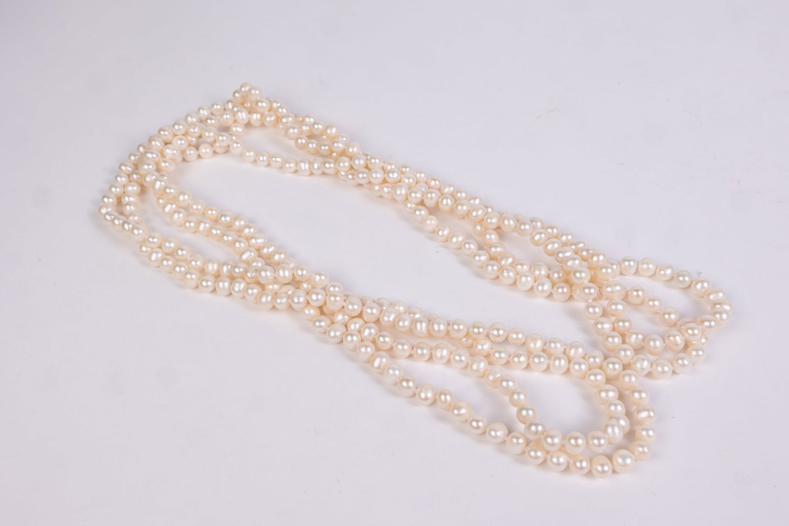 100 Inch Strand of Cultured Pearls: 100 Inch Strand of Cultured Pearls Literature Brooks Auction is not responsible for outbids. Questions? Call the office at (856) 694-2960 or email us directly at info@brooks.auction. • Please re