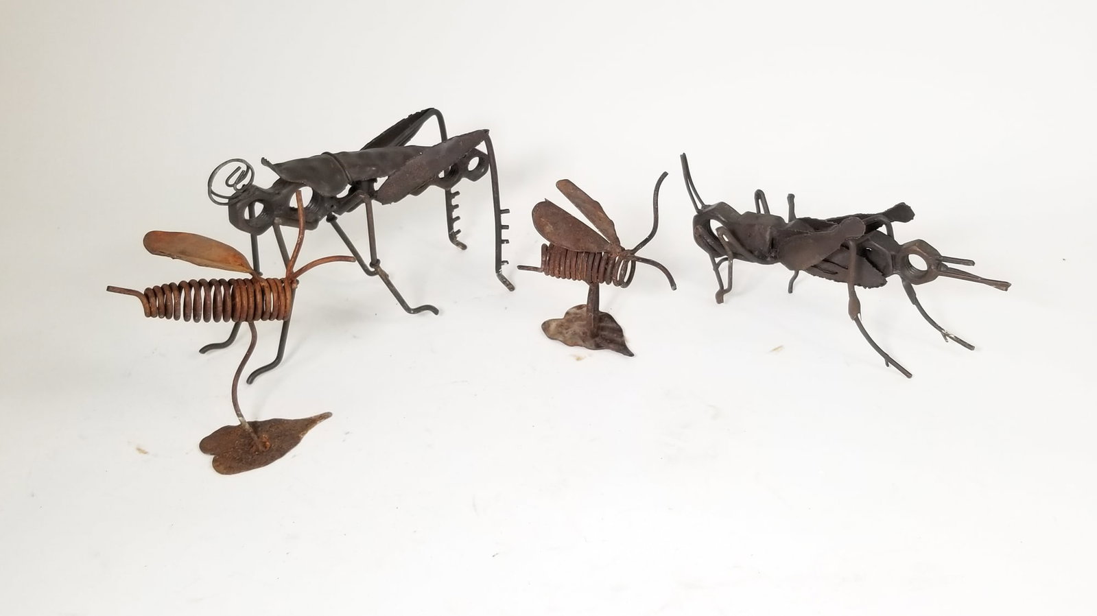 Folk Art Metal Insect Sculptures: Folk Art Metal Insect Sculptures Size 7" x 12" x 12" Literature Brooks Auction is not responsible for outbids. Questions? Call the office at (856) 694-2960 or email us directly at info@brooks.auctio