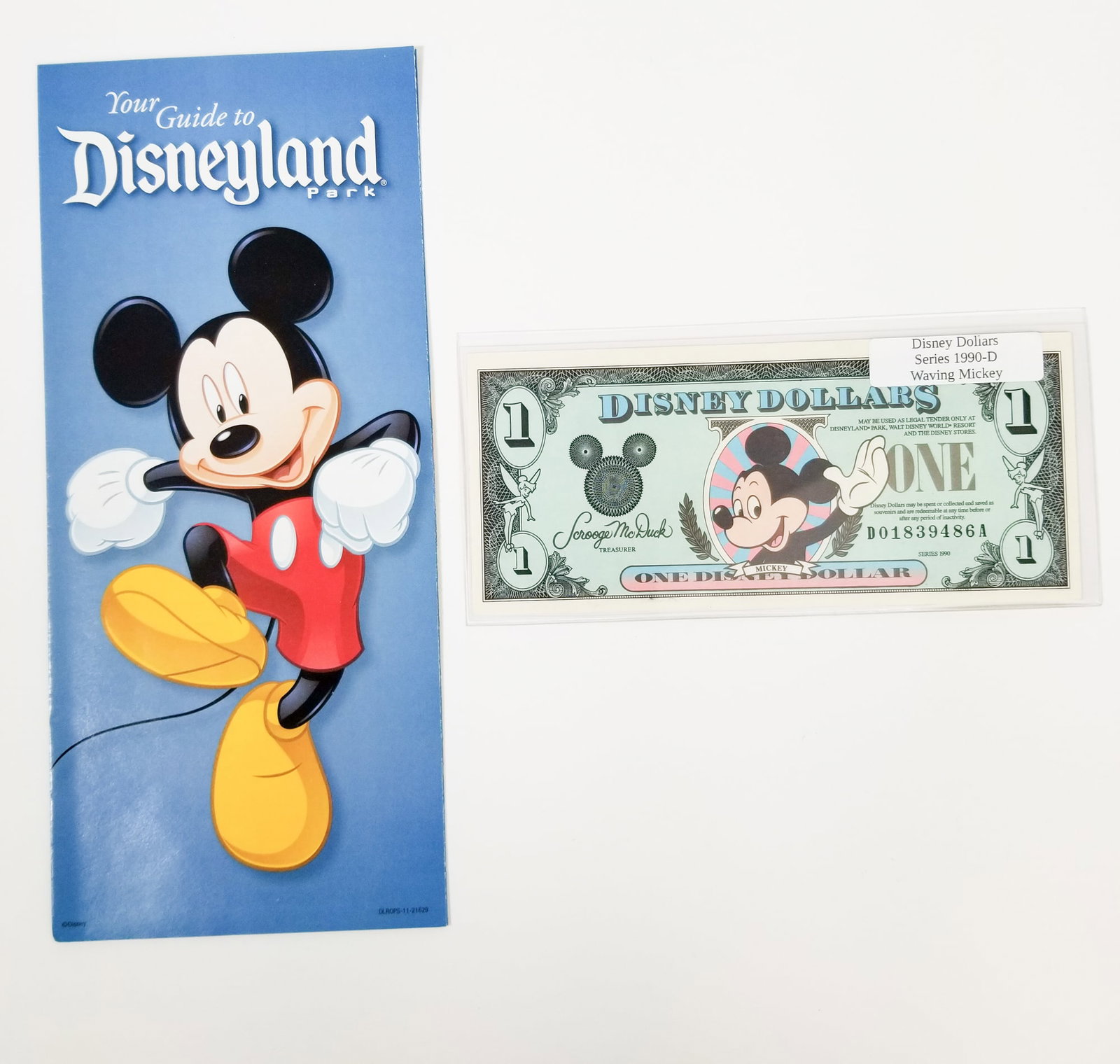 Disney Dollar Series 1990D Waving Mickey with Guide: Disney Dollar Series 1990D Waving Mickey with Guide Literature Brooks Auction is not responsible for outbids. Questions? Call the office at (856) 694-2960 or email us directly at info@brooks.auction. 