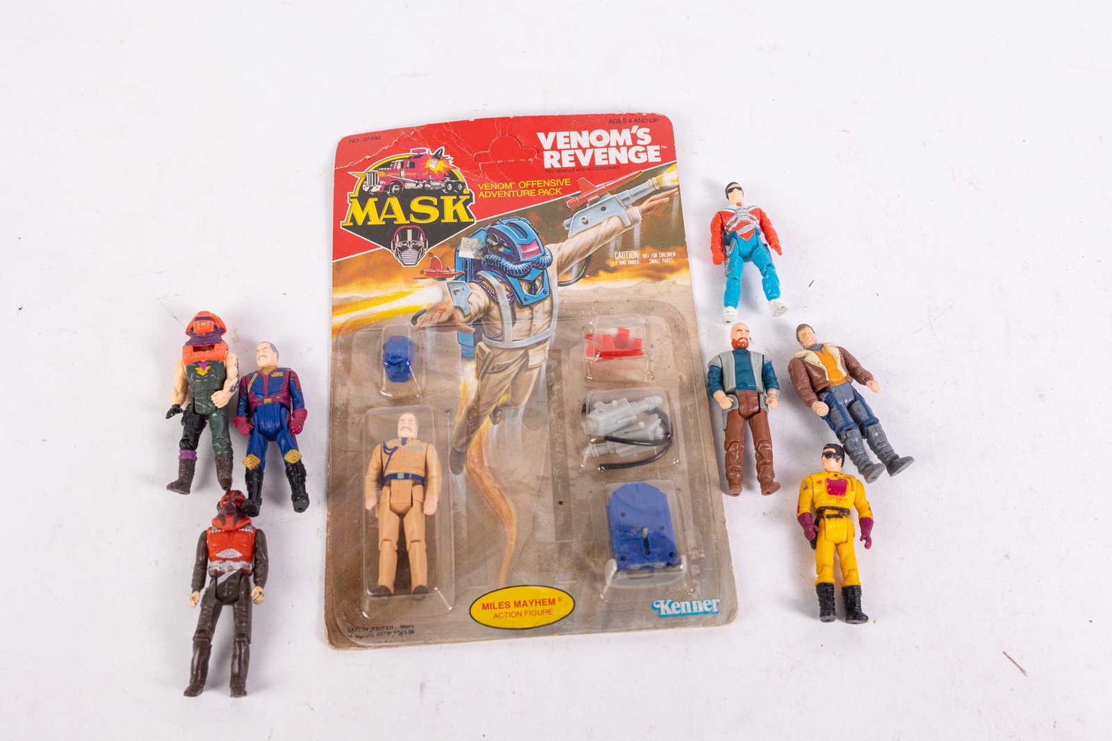 Vintage Kenner MASK Figures Featuring Sealed Miles Mayhem: Vintage Kenner MASK Figures Featuring Sealed Miles Mayhem Size 7" x 12" x 12" Literature Brooks Auction is not responsible for outbids. Questions? Call the office at (856) 694-2960 or email us direc