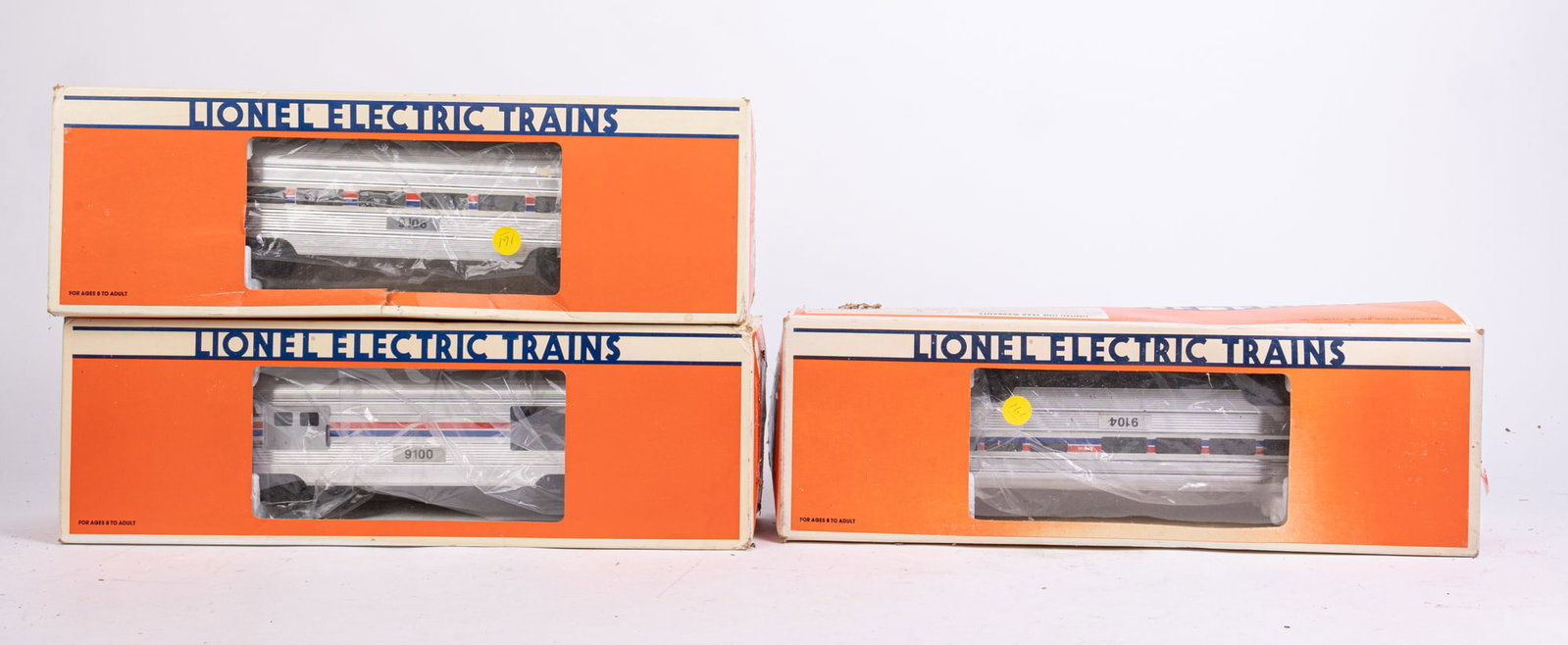 Three Lionel Amtrak O-Gauge Cars in Box: Three Lionel Amtrak O-Gauge Cars in Box: Amtrak Baggage Car 6-19100 - Amtrak Observation Car 6-19106 - Amtrak Dining Car 6-19104 Size 4" x 6" x 18" Literature Brooks Auction is not responsible for out