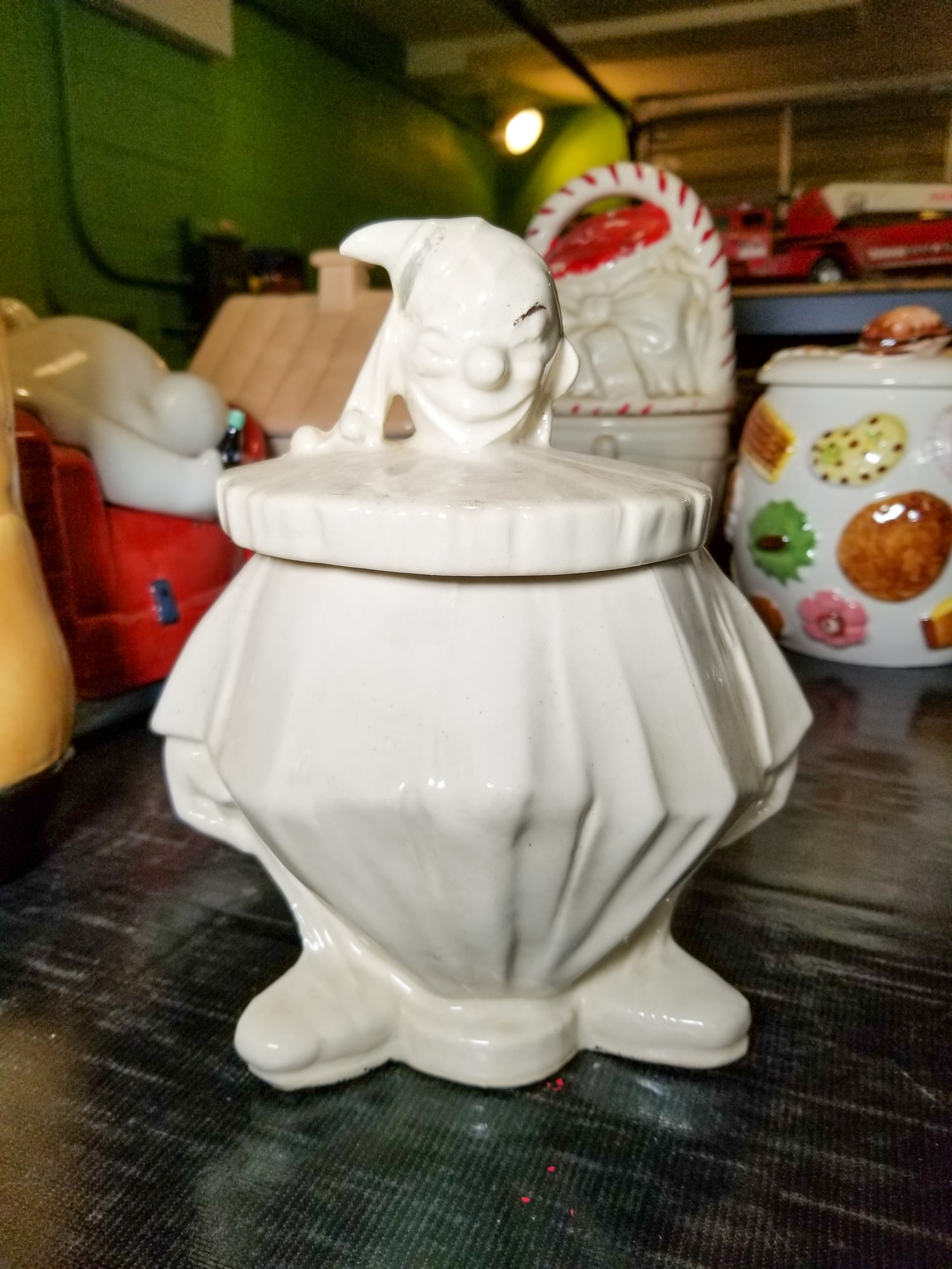 McCoy Clown Cookie Jar: McCoy Clown Cookie Jar, signed McCoy Size 8.5" Literature Brooks Auction is not responsible for outbids. Questions? Call the office at (856) 694-2960 or email us directly at info@brooks.auction.