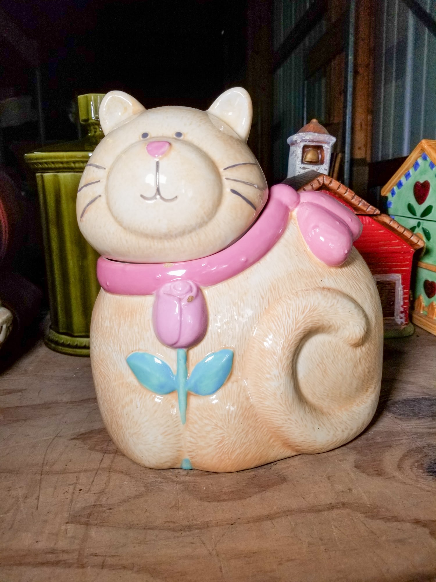 Cat Holding Flower Cookie Jar: Cat Holding Flower Cookie Jar Size 11" Literature Brooks Auction is not responsible for outbids. Questions? Call the office at (856) 694-2960 or email us directly at info@brooks.auction. R