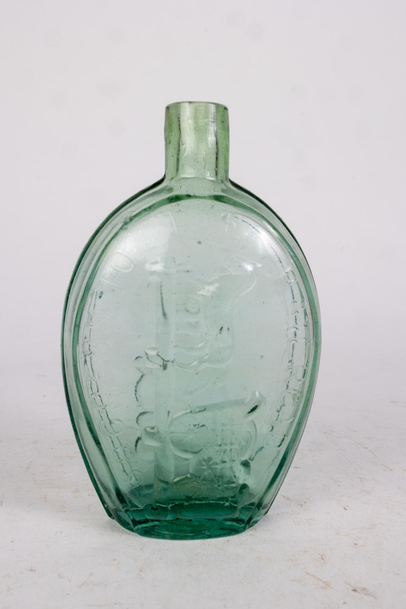 "Success to the Railroad" Aquamarine Glass Flask Pint Bottle: "Success to the Railroad" Aquamarine Glass Flask Pint Bottle. no chips or cracks, some imperfections deriving from bottle blowing process Size 7" H