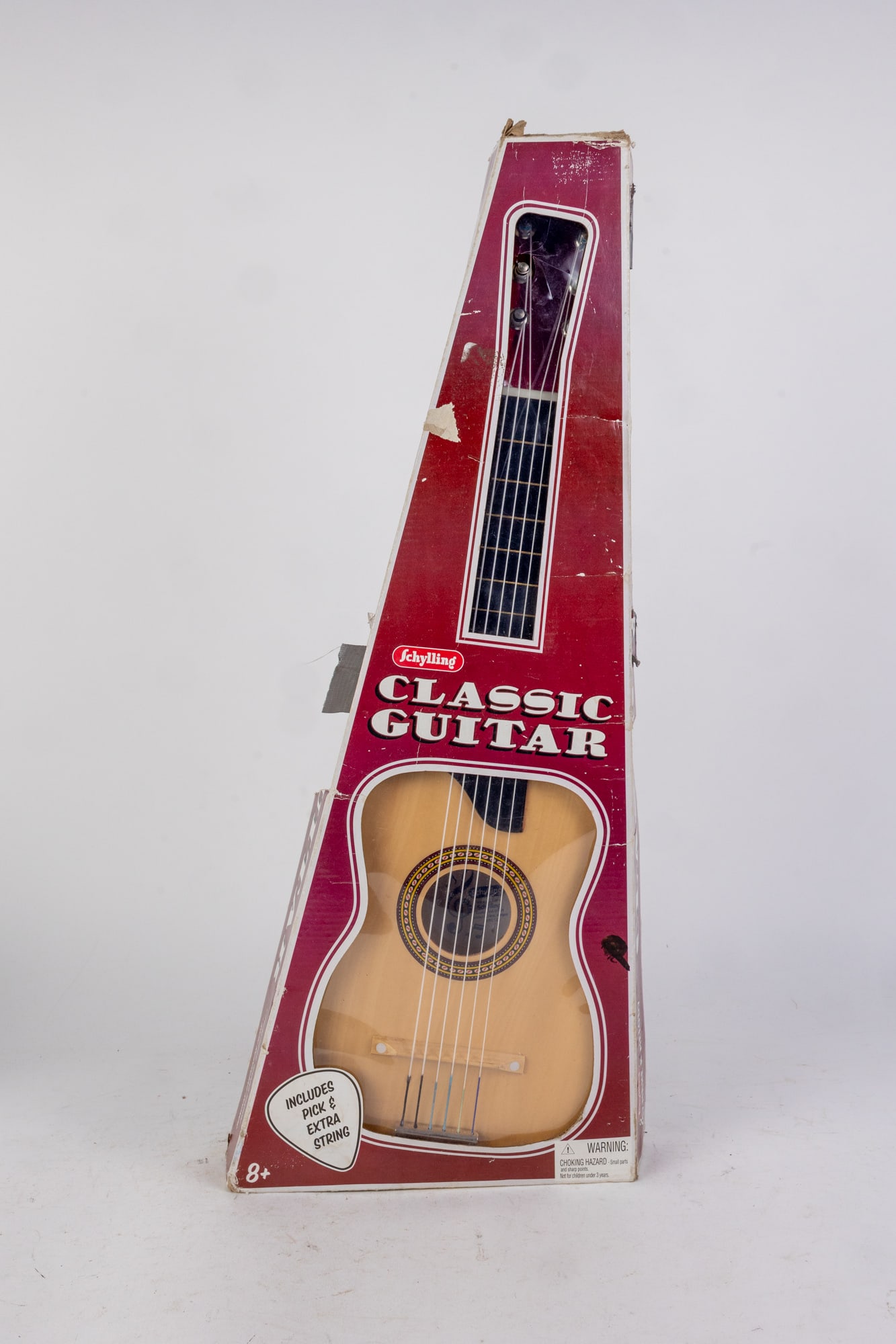 Schylling Classic Toy Miniature Guitar: Schylling Classic Toy Miniature Guitar, in original box Size 25" x 10" x 3"
