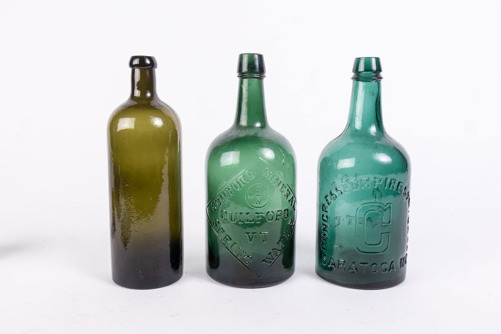 Three Green & Olive Mineral Spring Water Bottles (1 of 8)
