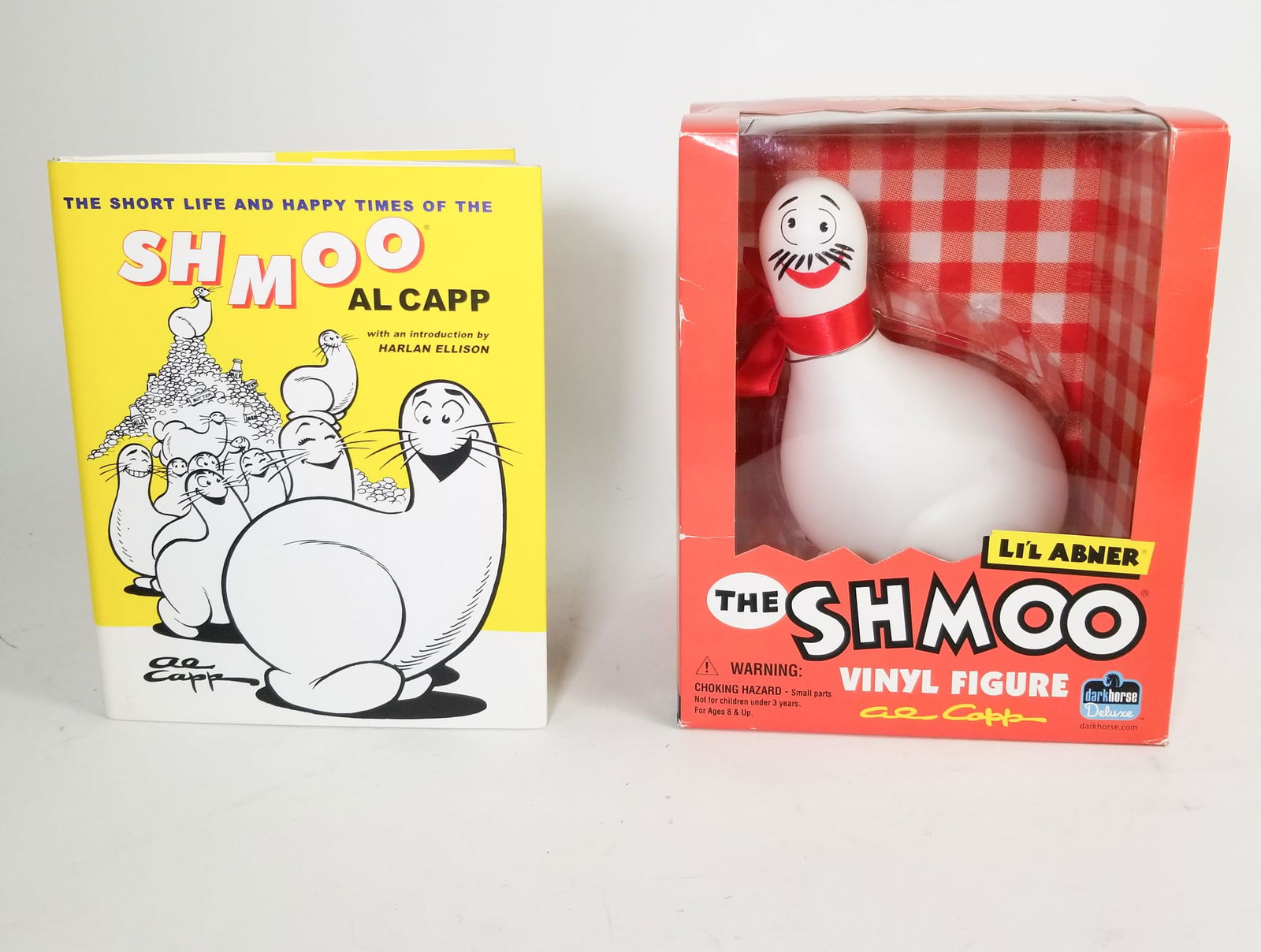 The Shmoo Li'l Abner Al Capp Comic Vinyl Figure Dark Horse Deluxe 2006 NIB: The Shmoo Li'l Abner Al Capp Comic Vinyl Figure Dark Horse Deluxe 2006 NIB, includes book Size 10" x 8" x 7" Literature Brooks Auction is not responsible for outbids. Questions? Call the office at (