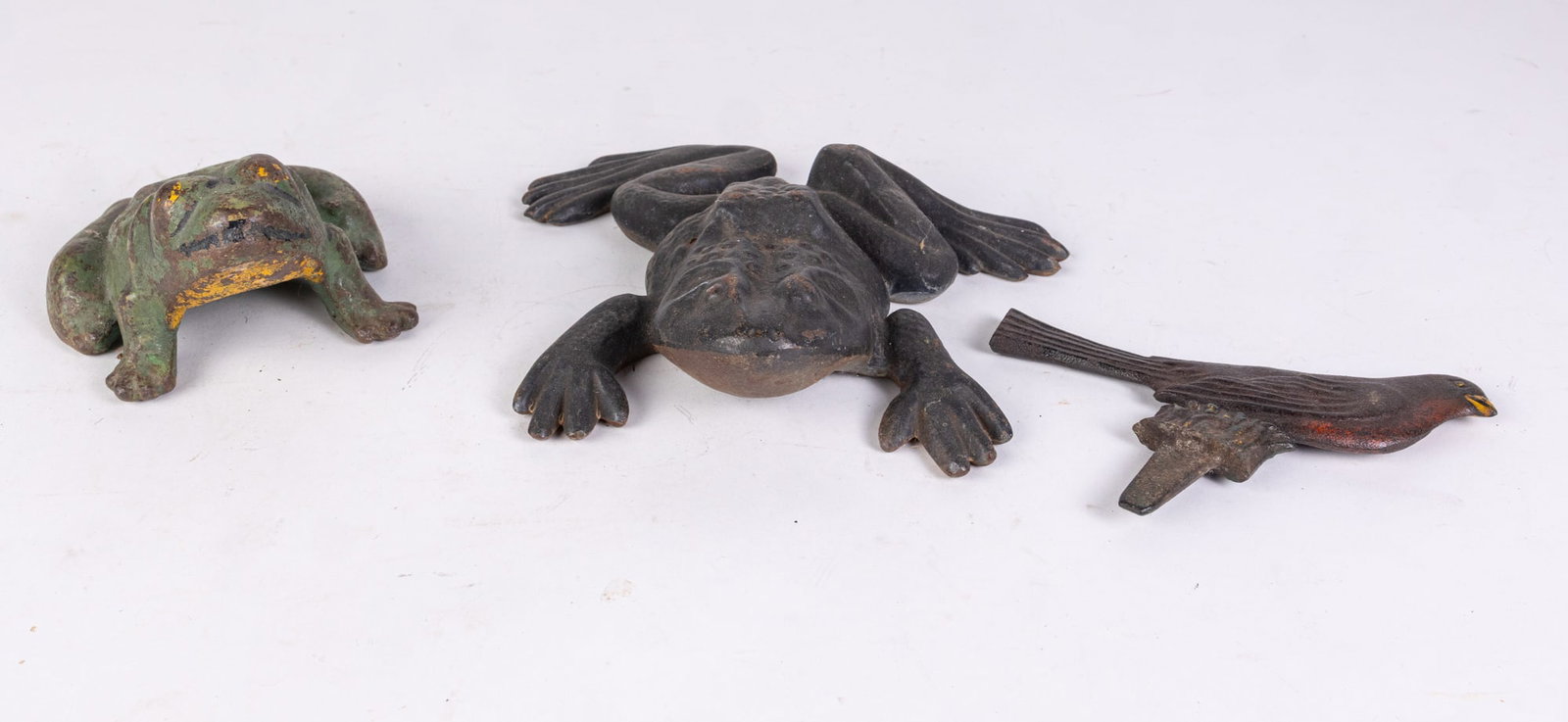 Vintage Cast Iron Frogs & Bird: Vintage Cast Iron Frogs & Bird Size 7" x 12" x 12" Literature Brooks Auction is not responsible for outbids. Questions? Call the office at (856) 694-2960 or email us directly at info@brooks.auction.