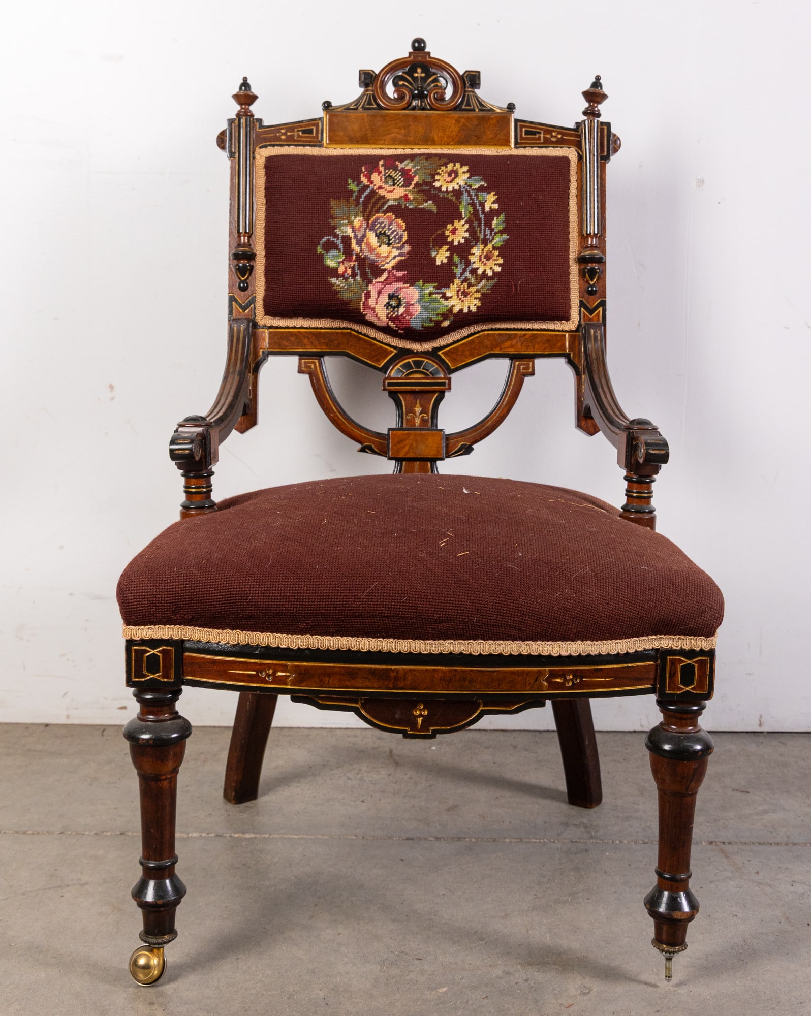 Antique Eastlake Victorian Needlepoint Chair: Antique Eastlake Victorian Needlepoint Chair. Top left corner is broken, see photos Size 37" x 20" x 21" Literature Brooks Auction is not responsible for outbids. Questions? Call the office at (856)