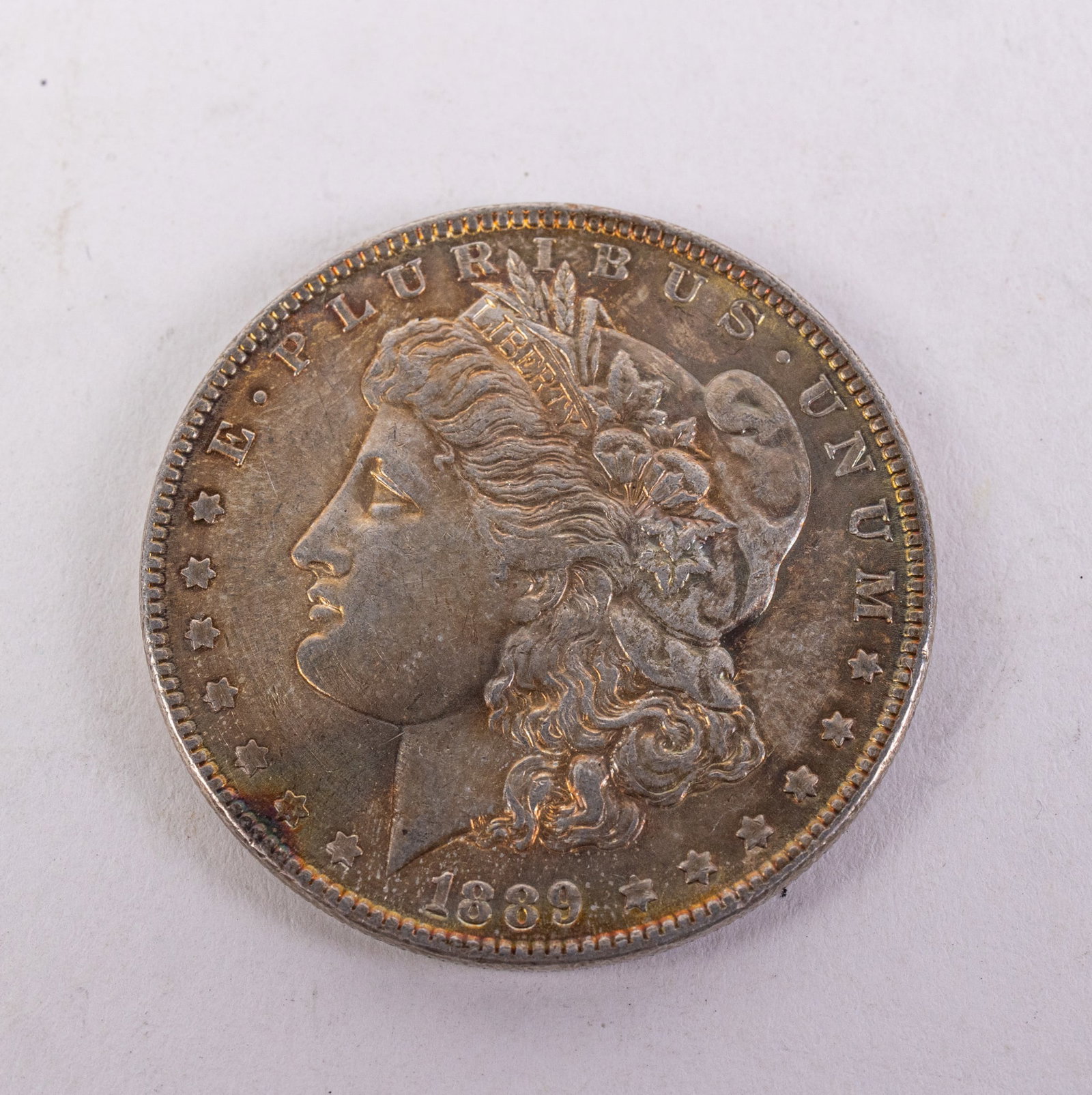 1889 Morgan Silver Dollar: 1889 Morgan Silver Dollar, .900 Silver Literature Brooks Auction is not responsible for outbids. Questions? Call the office at (856) 694-2960 or email us directly at info@brooks.auction. • Pleas