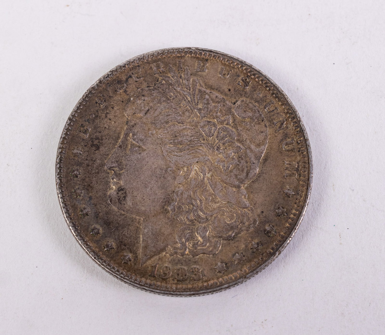 1903 Morgan Silver Dollar: 1903 Morgan Silver Dollar, .900 Silver Literature Brooks Auction is not responsible for outbids. Questions? Call the office at (856) 694-2960 or email us directly at info@brooks.auction. • Pleas