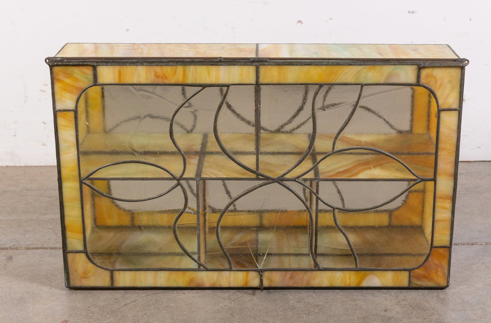 Leaded Slag Glass Display Tabletop Cabinet: Leaded Slag Glass Display Tabletop Cabinet, some cracking Size 20" x 13" x 5" Literature Brooks Auction is not responsible for outbids. Questions? Call the office at (856) 694-2960 or email us direc
