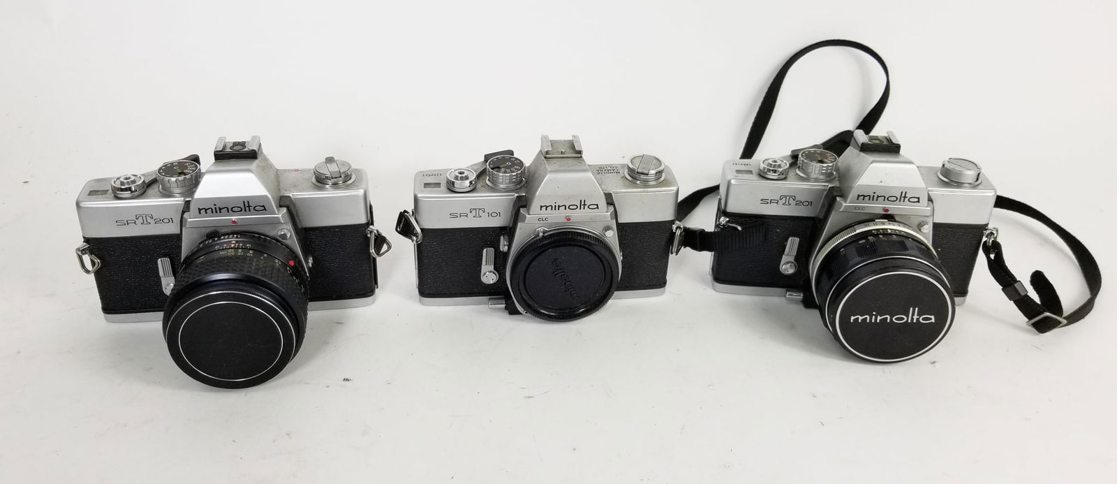Minolta SRT 101 & 2 SRT201's SLR Cameras (1 of 8)