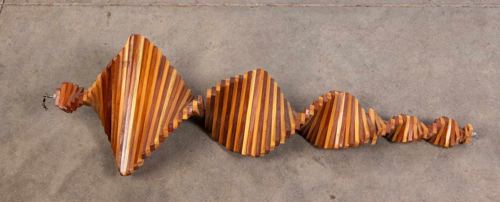 Wood Helix Kinetic Hanging Sculpture: Wood Helix Kinetic Hanging Sculpture Size 37" H Literature Brooks Auction is not responsible for outbids. Questions? Call the office at (856) 694-2960 or email us directly at info@brooks.auction.