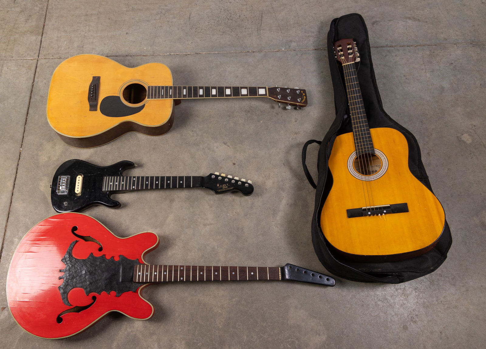 Four Guitars: Four Guitars: Jr. Pro Synsonics electric children's guitar - guitar with hollow body electric body, leather detail, and unmarked neck. no interior components/strings. as is condition - Ariana vintage