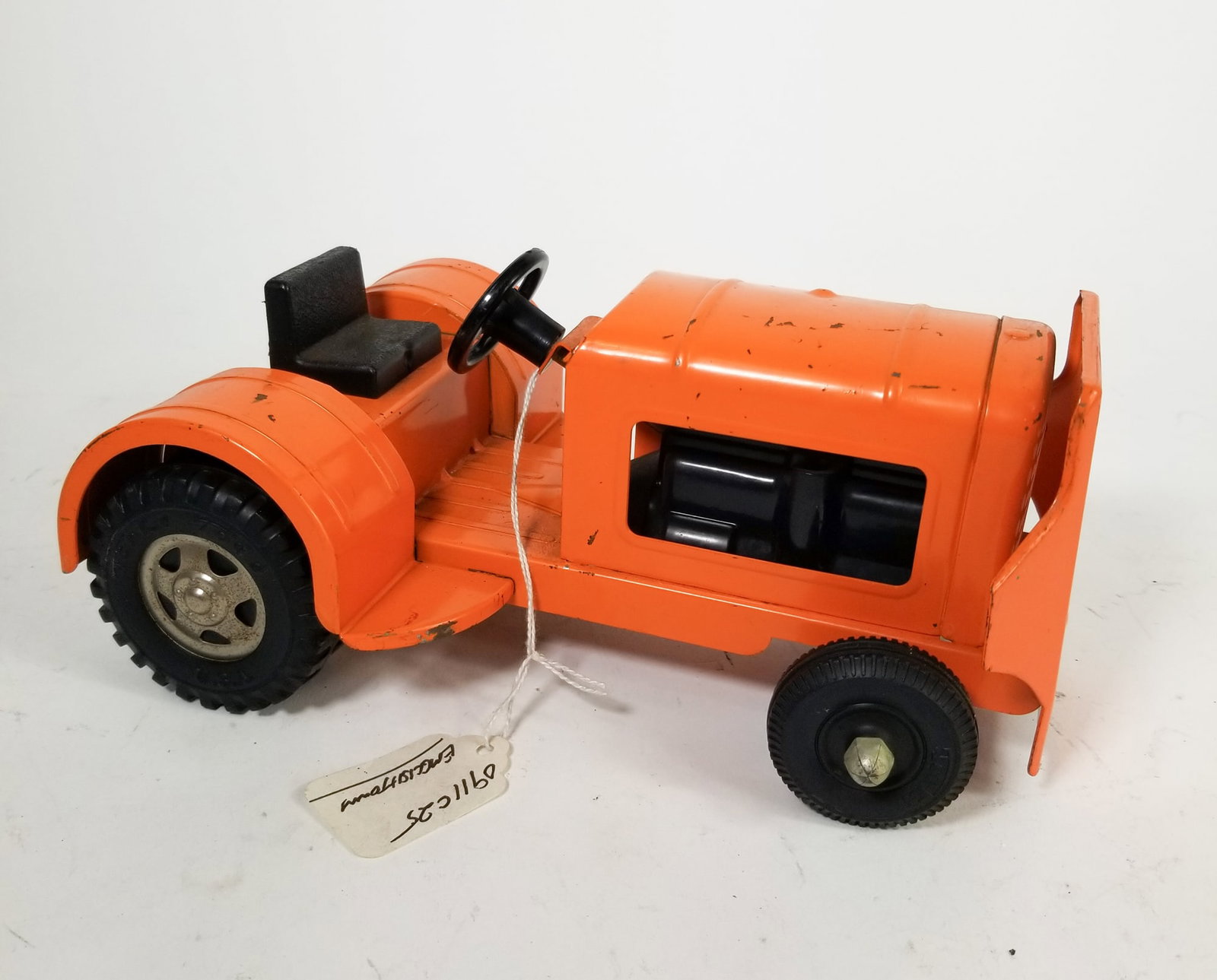 Tonka Orange 1960's Airport Tractor: Tonka Orange 1960's Airport Tractor Size 4" x 6" x 10" Literature Brooks Auction is not responsible for outbids. Questions? Call the office at (856) 694-2960 or email us directly at info@brooks.auct