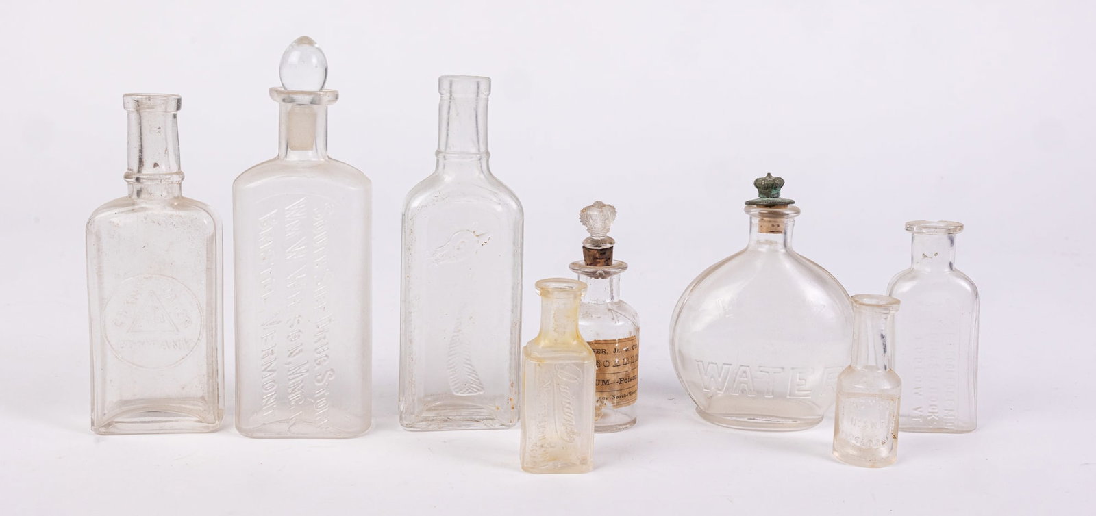 Eight Antique Apothecary Bottles Featuring Laudanum Poison Bottle (1 of 10)