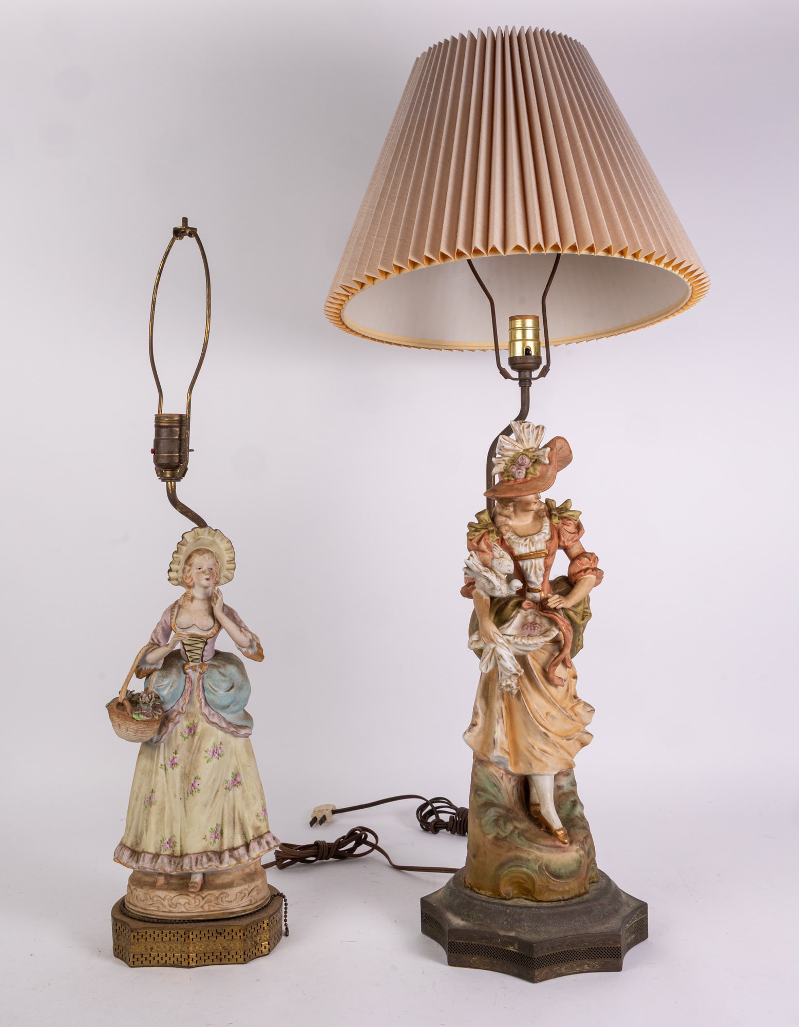 Pair of Capodimonte Porcelain Figural Lamps: Pair of Capodimonte Porcelain Figural Lamps Literature Brooks Auction is not responsible for outbids. Questions? Call the office at (856) 694-2960 or email us directly at info@brooks.auction. •