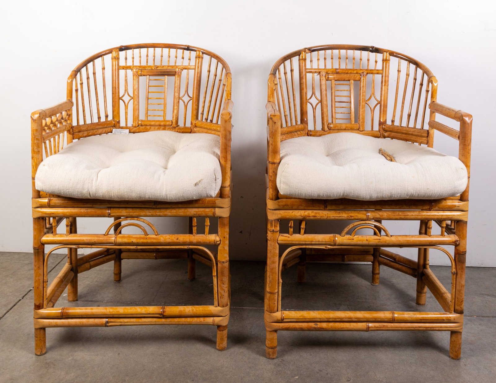Mid Century Brighton Pavilion Style Chinese Chippendale Rattan & Woven Cane Armchair: Mid Century Brighton Pavilion Style Chinese Chippendale Rattan & Woven Cane Armchair: one of the chairs has missing/detached reeds on the arm rest Size 35" x 22" x 25" Literature Brooks Auction is not