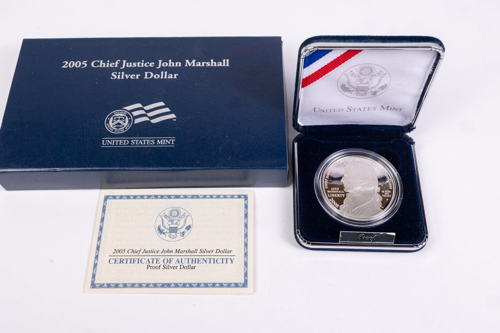 2005P Chief Justice John Marshall Proof Silver Dollar: 2005P Chief Justice John Marshall Proof Silver Dollar, United States Mint, in box with COA, .900 Silver Literature Brooks Auction is not responsible for outbids. Questions? Call the office at (856) 6