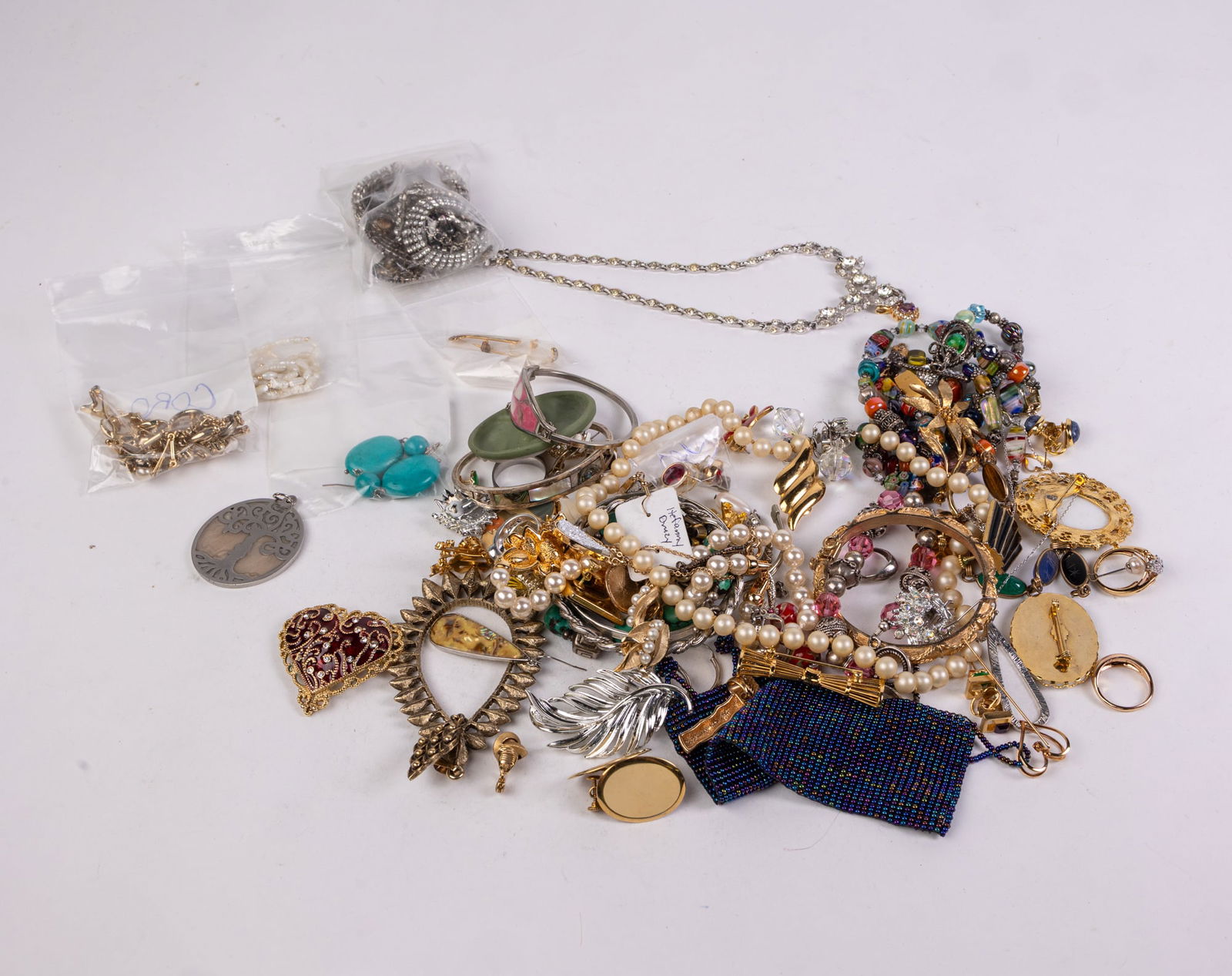 Vintage Costume Jewelry Featuring Rhinestone Bogoff Necklace: Vintage Costume Jewelry Featuring Rhinestone Bogoff Necklace, brands include: Trifari, Monet, Coro, and more Literature Brooks Auction is not responsible for outbids. Questions? Call the office at (8