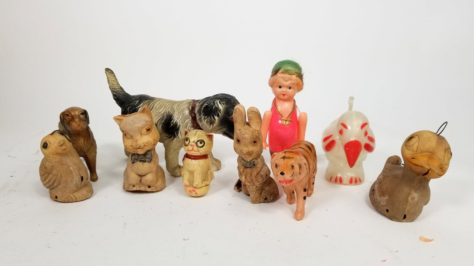 Antique Early Toy Assortment ft Celluloid Animals: Antique Early Toy Assortment ft Celluloid Animals Size 7" x 12" x 12" Literature Brooks Auction is not responsible for outbids. Questions? Call the office at (856) 694-2960 or email us directly at i