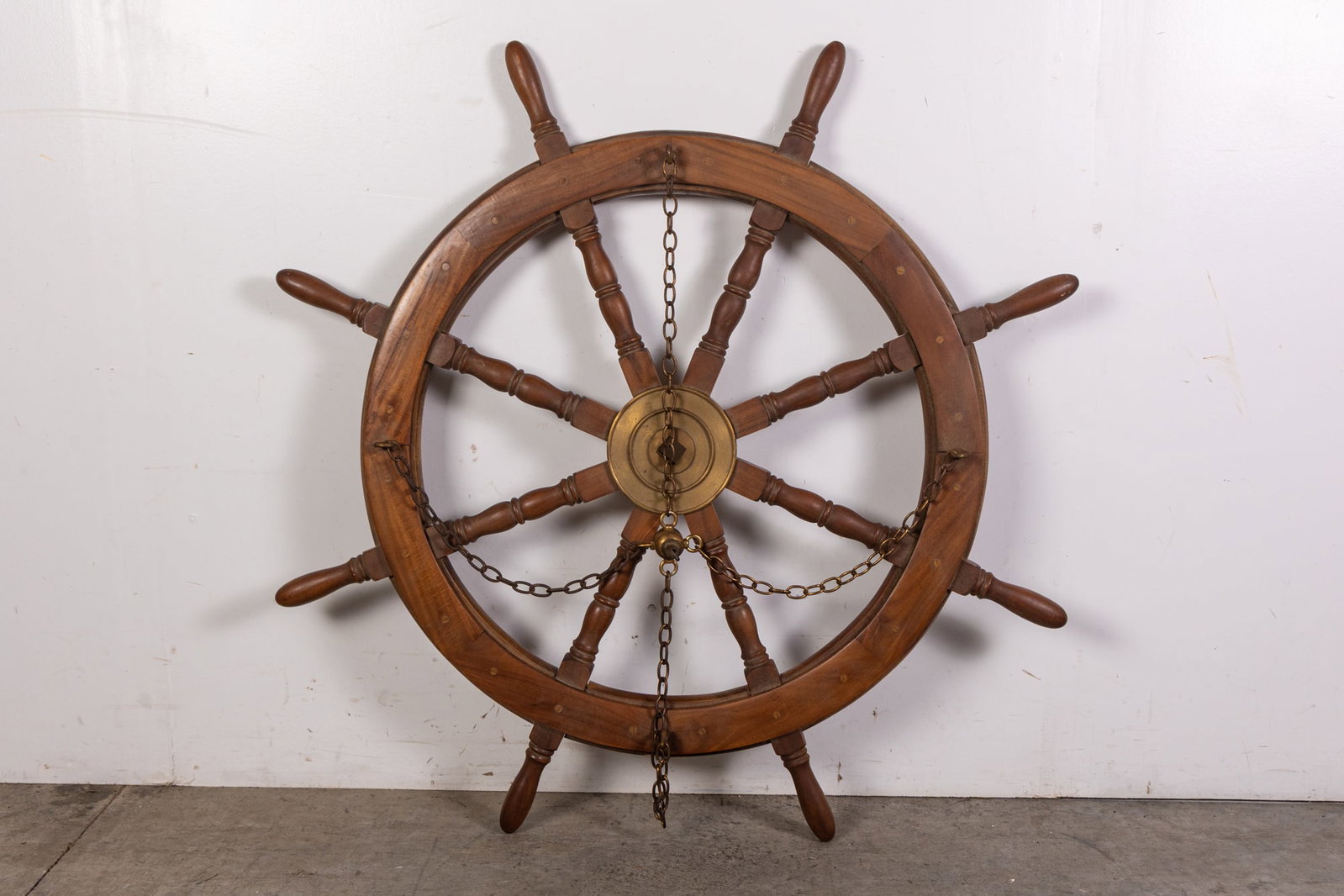 Vintage Wood and Brass Ship's Helm: Vintage Wood and Brass Ship's Helm, modified to hang from ceiling Size 43" H Literature Brooks Auction is not responsible for outbids. Questions? Call the office at (856) 694-2960 or email us direct