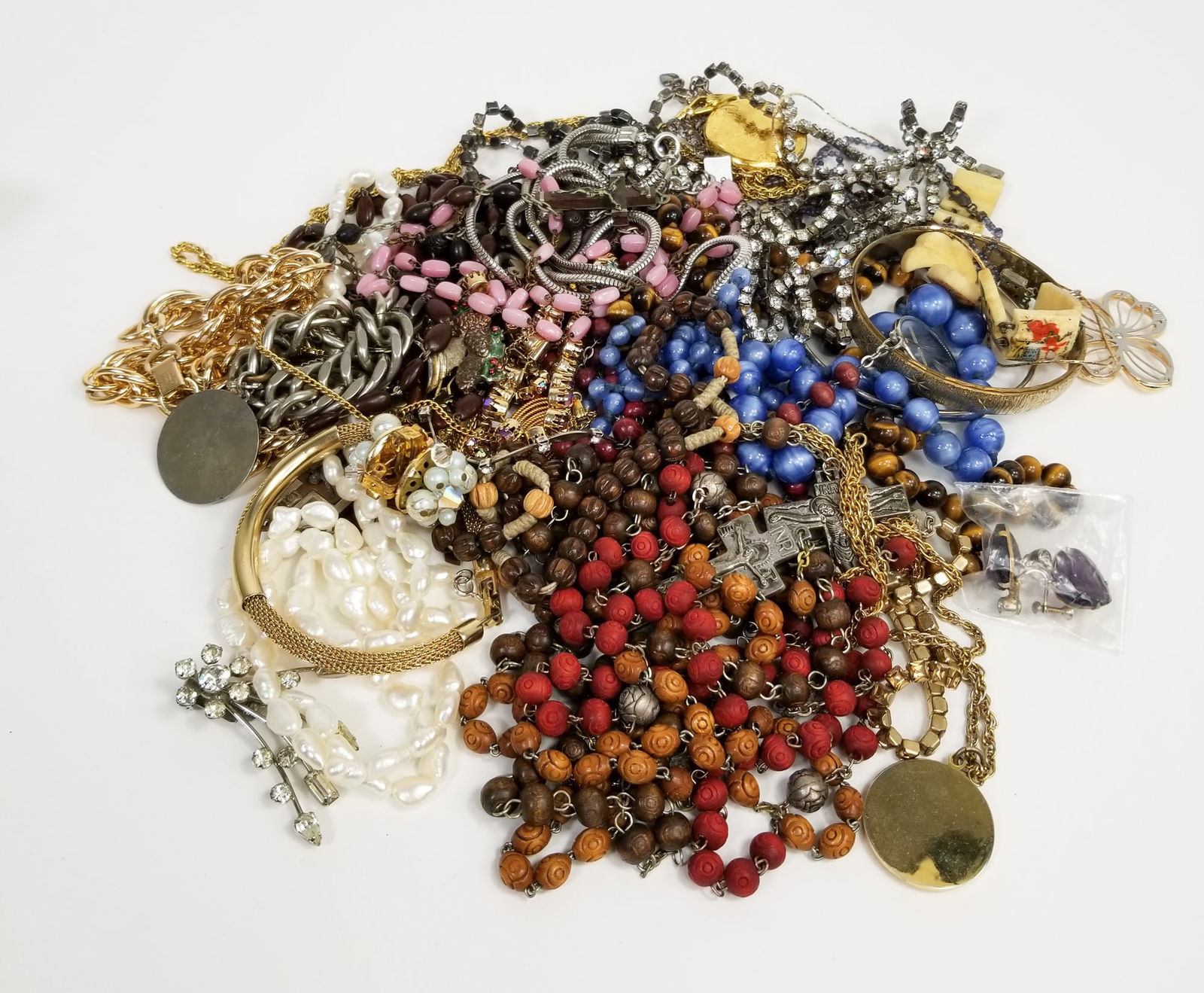 Assorted Costume Jewelry: Assorted Costume Jewelry, brands include: Monet, Trifari, and more Literature Brooks Auction is not responsible for outbids. Questions? Call the office at (856) 694-2960 or email us directly at info@