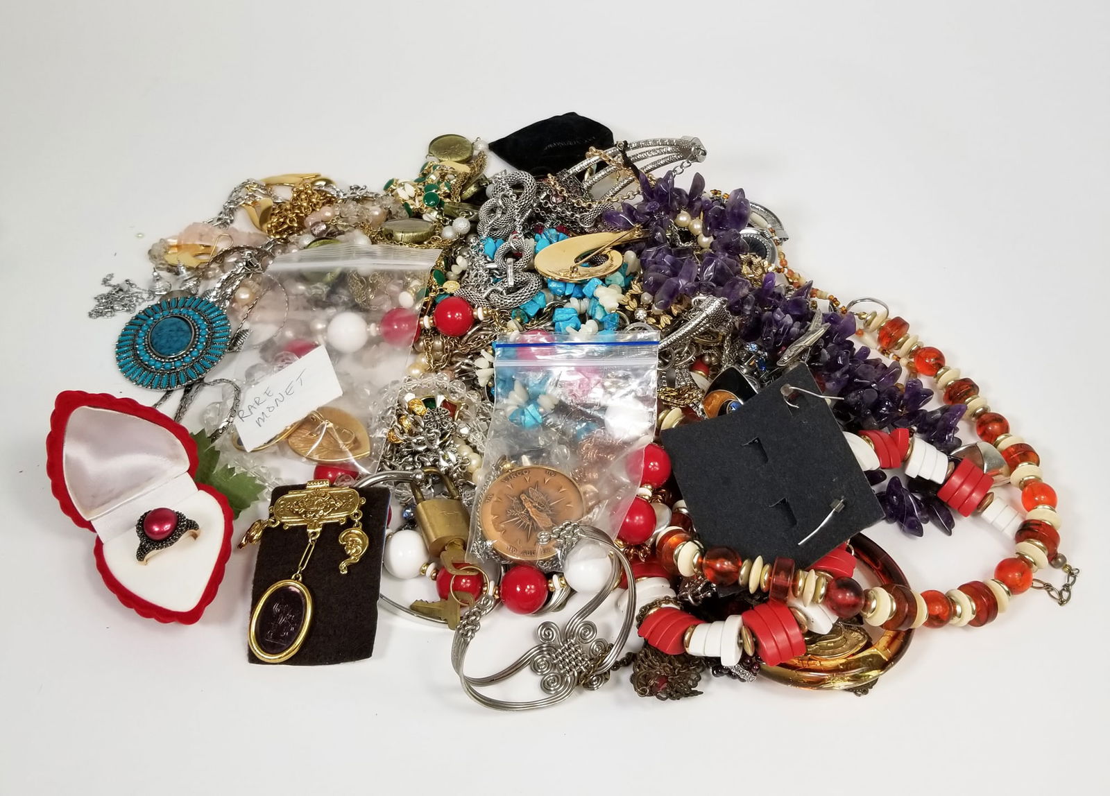 Assorted Vintage Costume Jewelry: Assorted Vintage Costume Jewelry, brands include: Monet - Trifari - Talbots - Premier Designs - Swarovski - Jay Strongwater - Sarah Cov - and more Literature Brooks Auction is not responsible for out