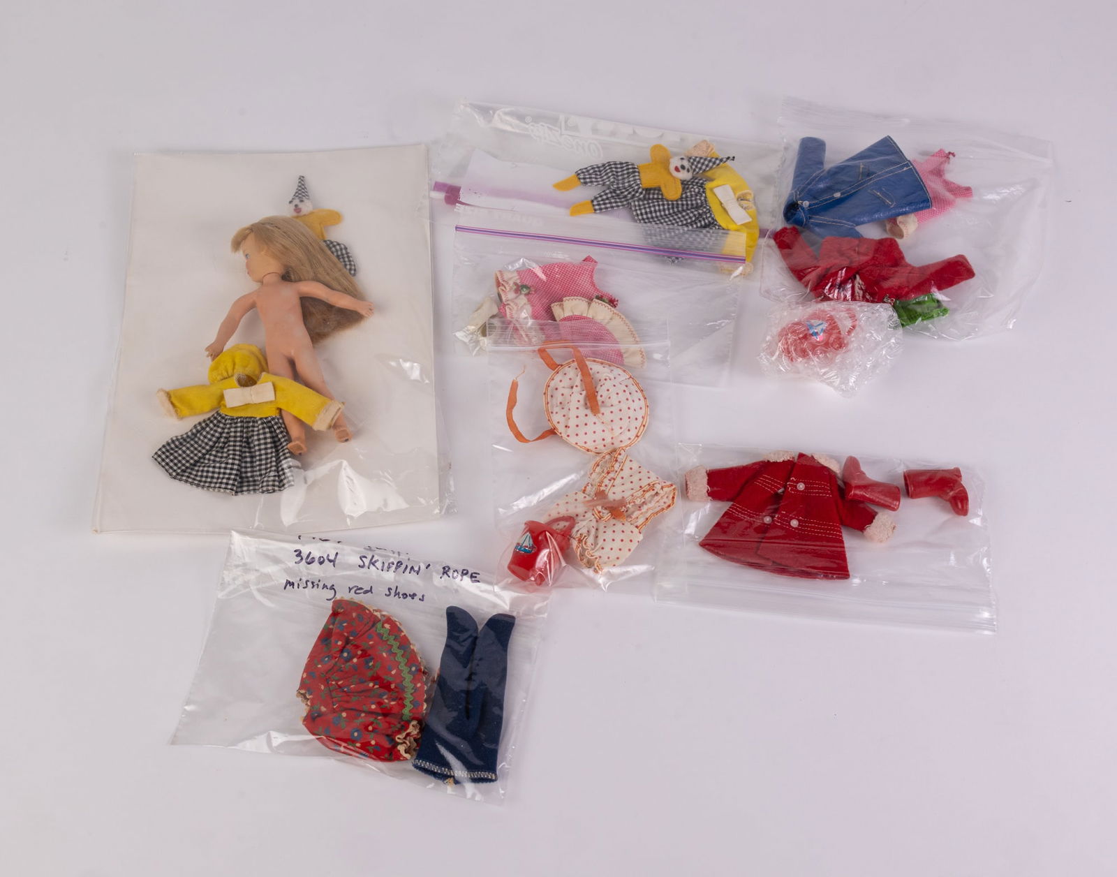 Vintage 1965 Mattel Barbie "Tutti Clowning Around" & Assorted Outfits & Accessories: Vintage 1965 Mattel Barbie "Tutti Clowning Around" & Assorted Outfits & Accessories Literature Brooks Auction is not responsible for outbids. Questions? Call the office at (856) 694-2960 or email us