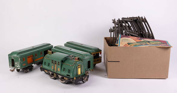 Lionel 352 E Set with Original Box: Lionel 352 E Set with Original Box: includes Lionel 332 railway mail car, Lionel 339 passenger car, Lionel 341 passenger car, and Lionel 10E caboose. some wear to paint and original box is in as-is co