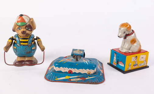 Three Vintage Tin Litho Toys: Three Vintage Tin Litho Toys: Bonzo the Educated Counting and Barking Dog - Dog Jumping Rope wind up tin toy - Linemar mechanical rocket express - Literature  Brooks Auction is not responsible for out
