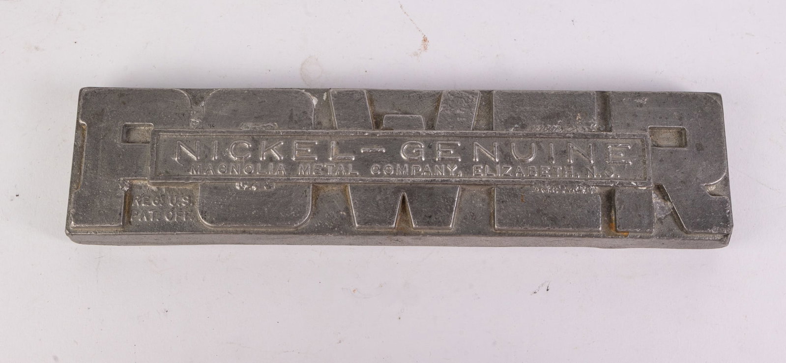 Magnolia Metal Company Elizabeth NJ Babbitt Bar Metal Ingot: Magnolia Metal Company Elizabeth NJ Babbitt Bar Metal Ingot, weighs 3lbs 1oz Size 9" x 2" Literature Brooks Auction is not responsible for outbids. Questions? Call the office at (856) 694-2960 or em